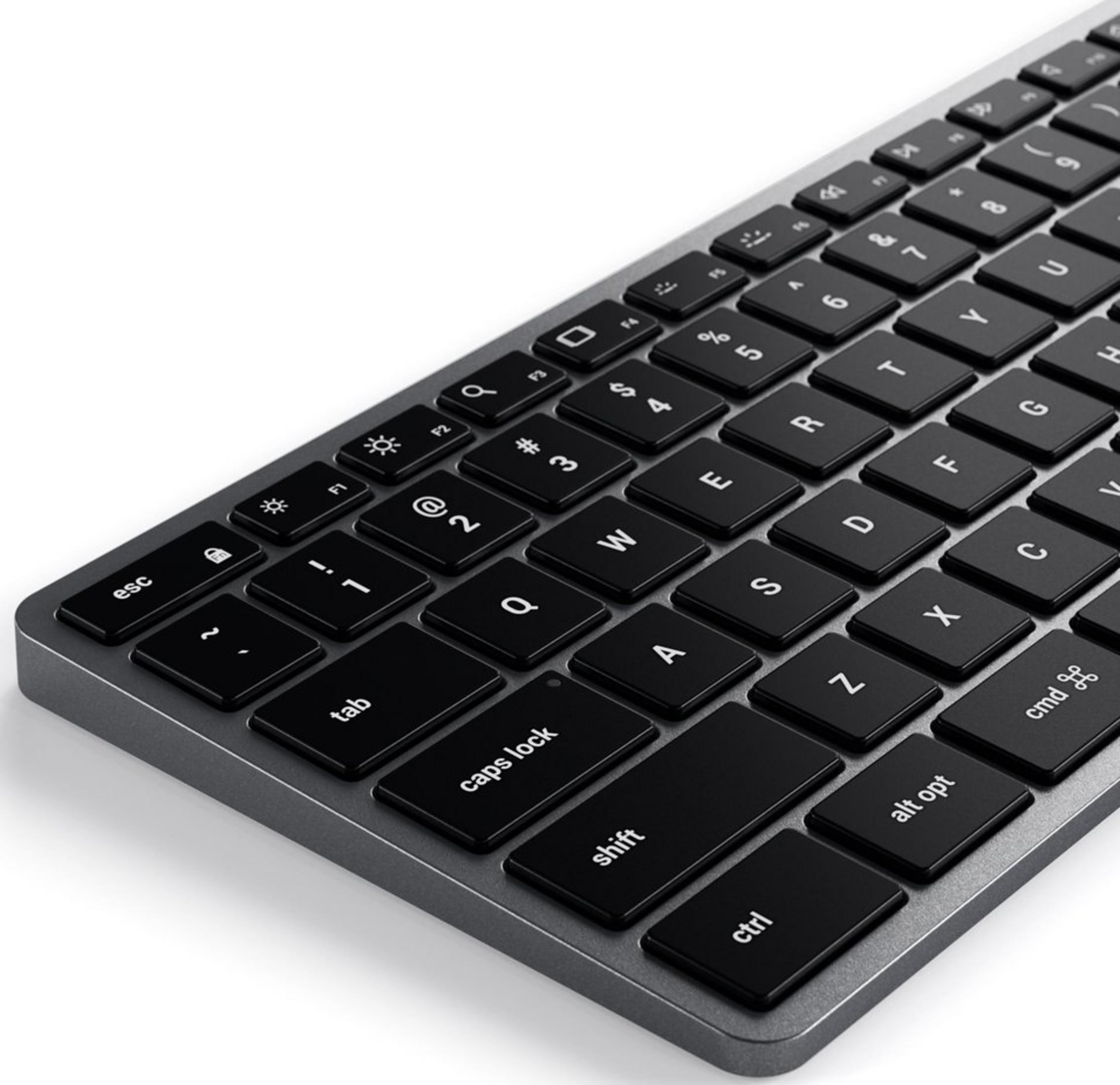 Eine Nahaufnahme einer modernen, dunkelgrauen Tastatur mit schwarzen Tasten.