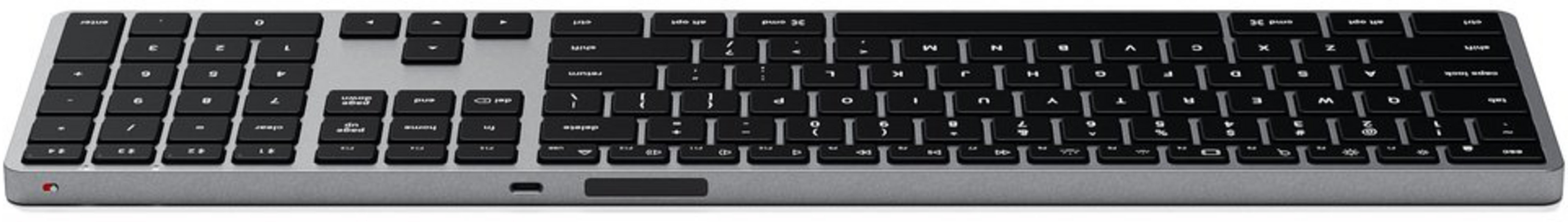 Eine graue Tastatur mit schwarzen Tasten und einem Nummernblock.