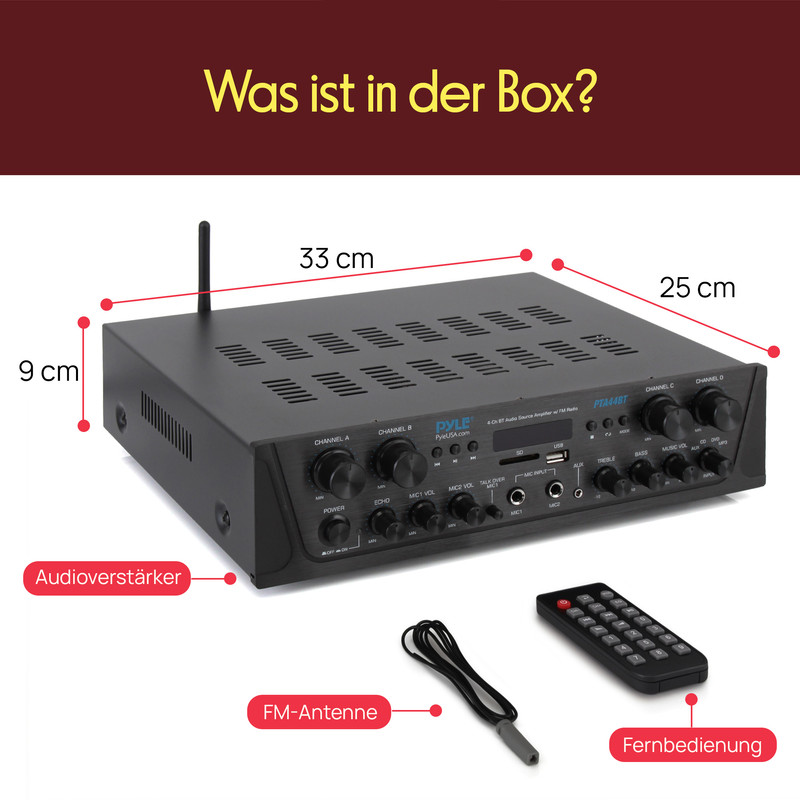 Ein schwarzer Audioverstärker mit FM-Antenne und Fernbedienung.