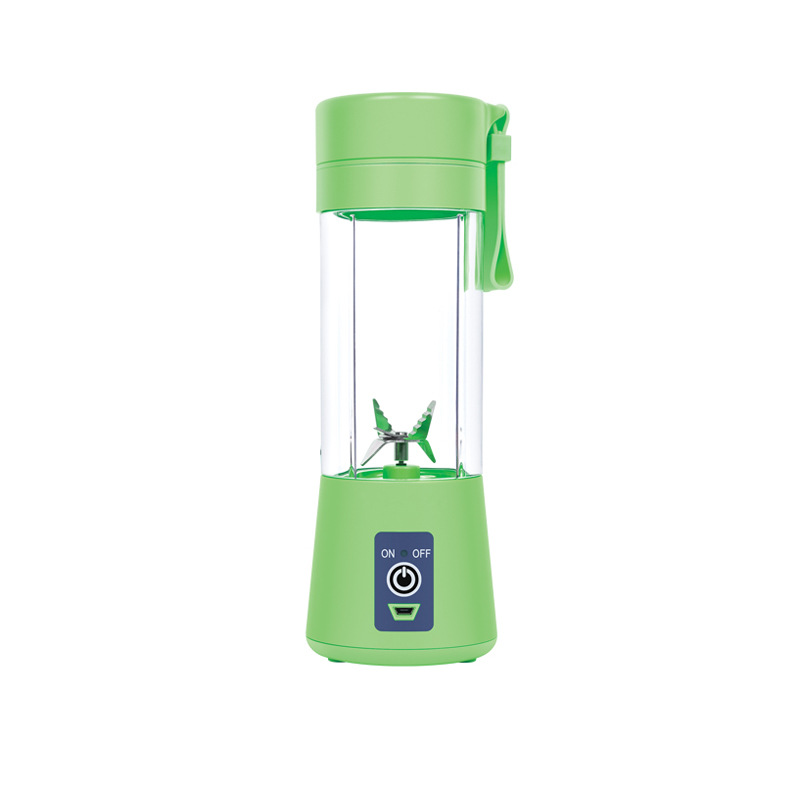 Grüner tragbarer Mixer mit transparentem Behälter und Klingen.