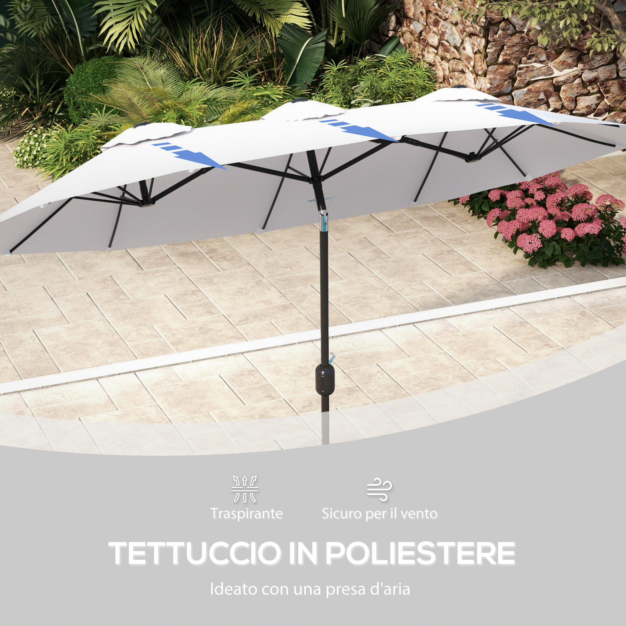 Un grande ombrellone bianco con strisce blu su un'area pavimentata.