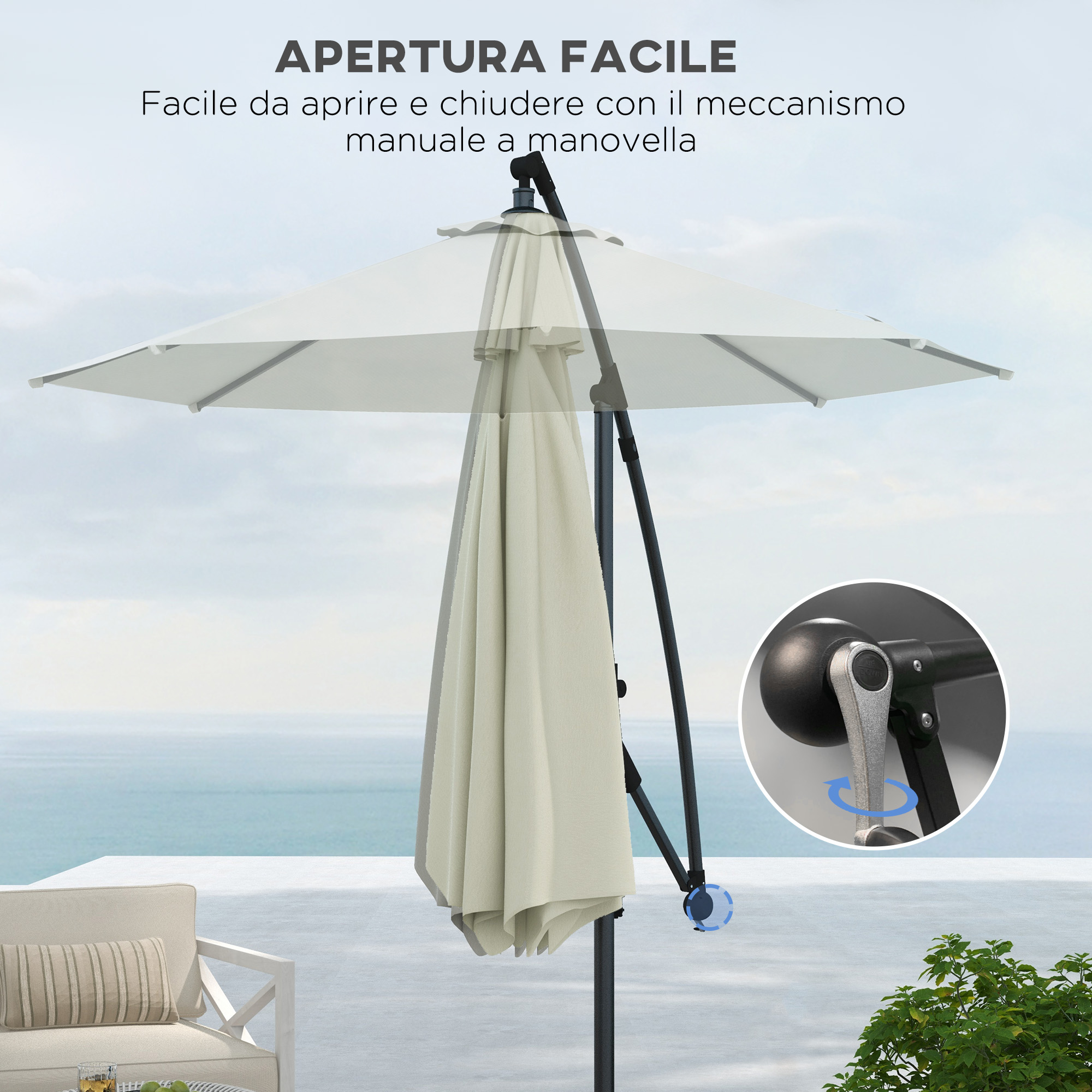 Un ombrellone beige con meccanismo a manovella su una terrazza sul mare.