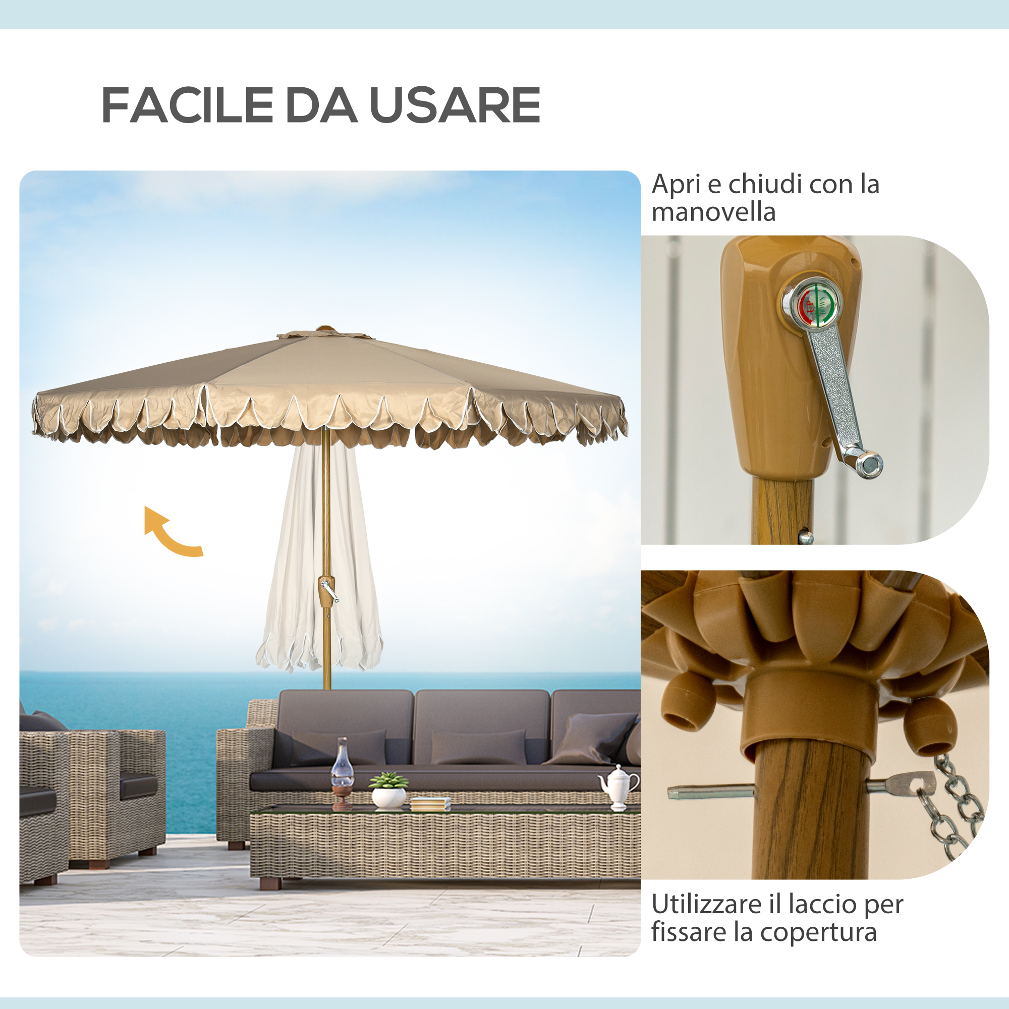 Un ombrellone beige con bordo smerlato sta sopra un divano in rattan sul mare.