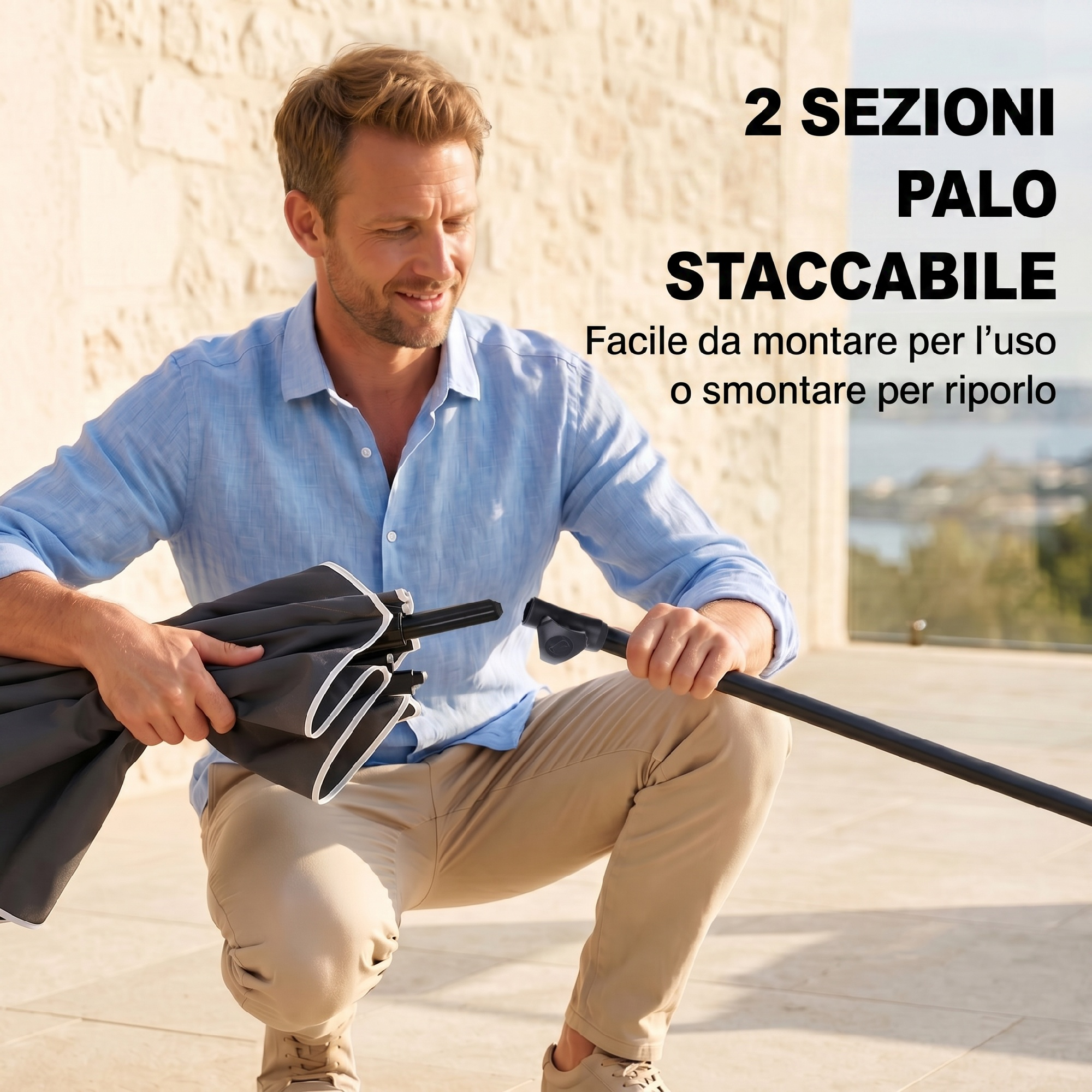 Uomo che monta un'asta per ombrellone staccabile in due sezioni.