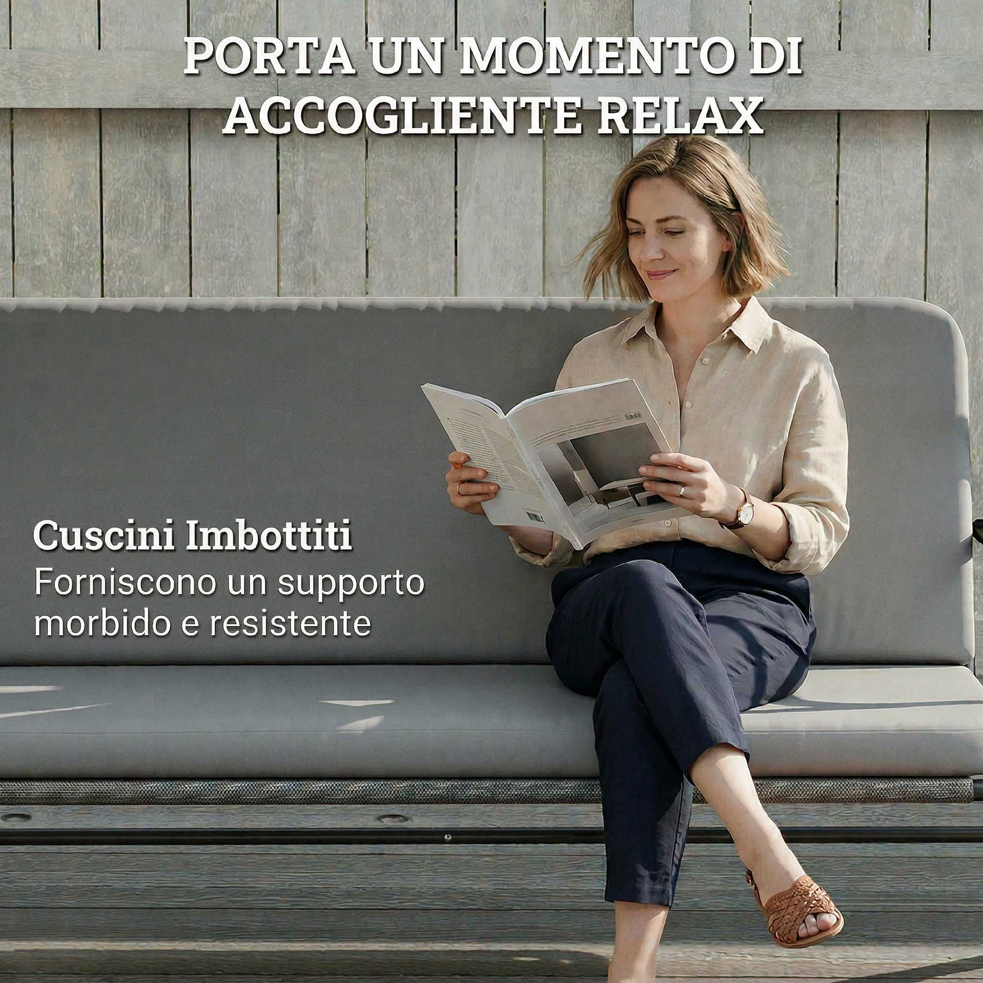 Una donna seduta su una panchina grigia legge un libro all'aperto.