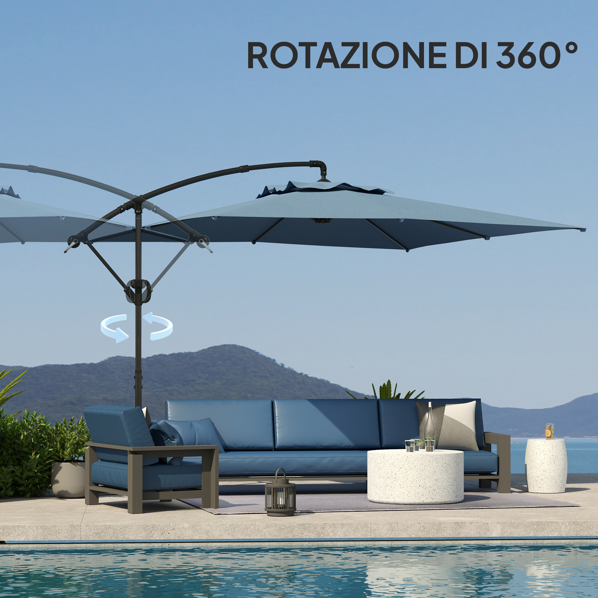 Un salotto da esterno blu vicino a una piscina, con un grande ombrellone e montagne sullo sfondo.