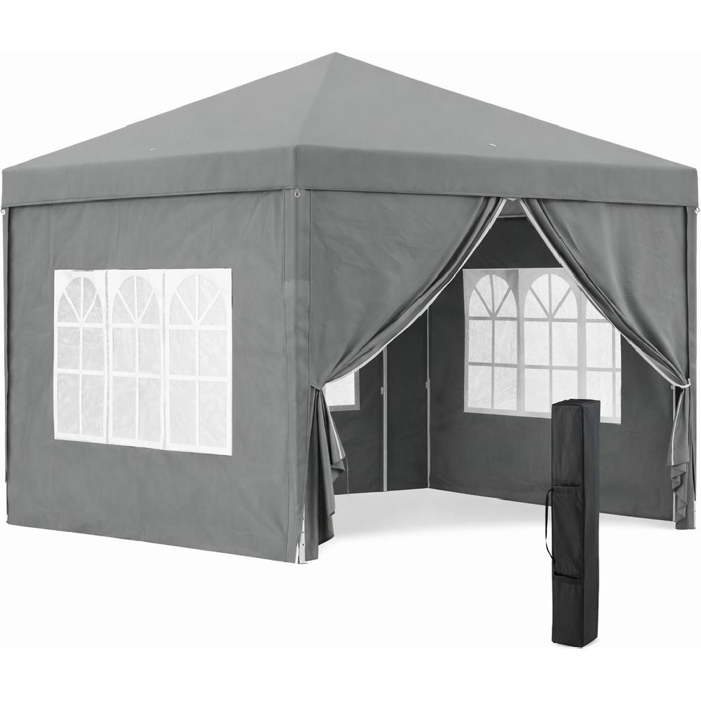 Tenda grigia con finestre e una borsa da trasporto nera accanto.