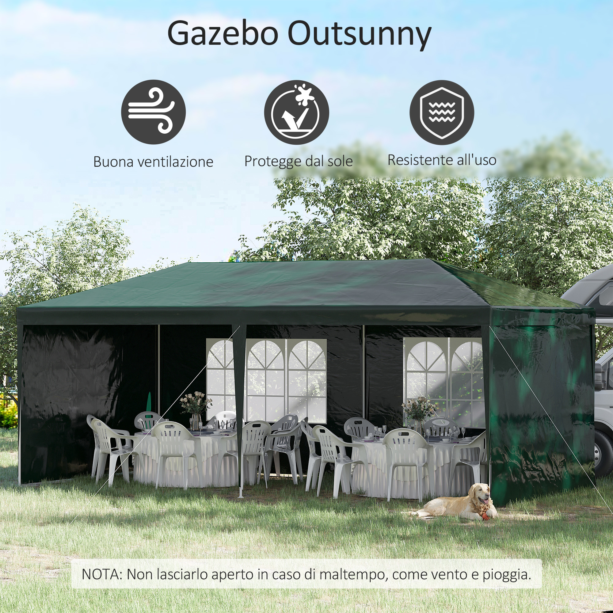 Un gazebo verde con tavoli, sedie e un cane sull'erba.
