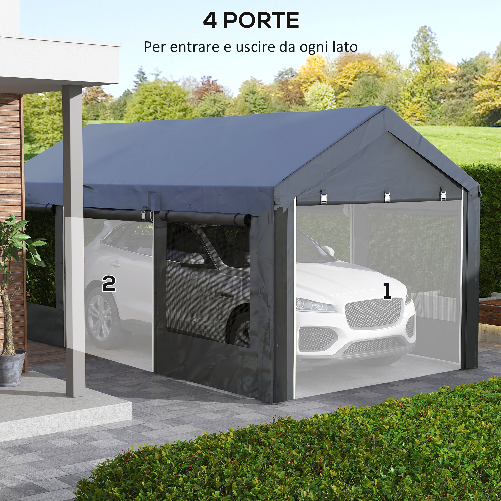 Una tenda grigia con due auto all'interno, accanto a una casa.