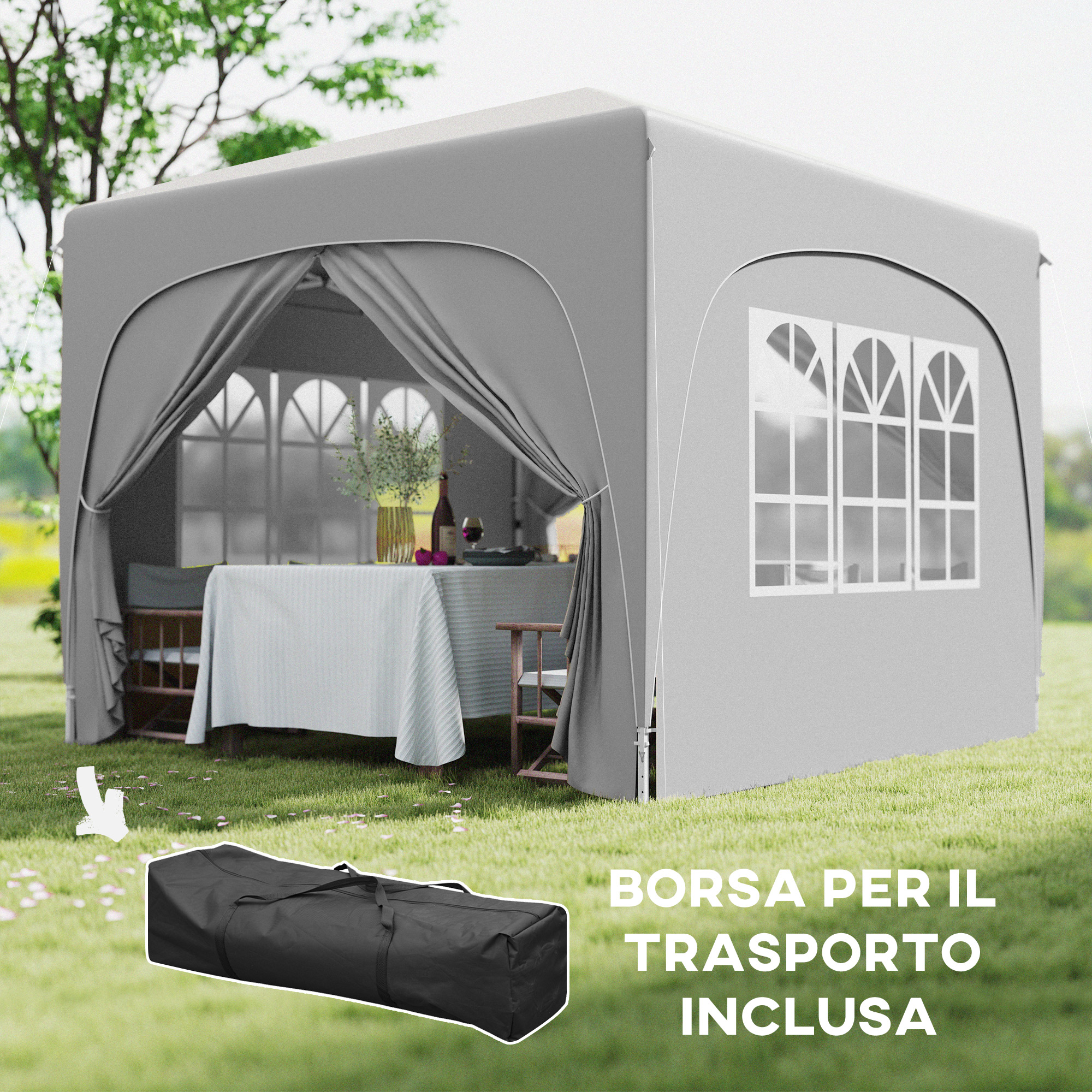 Tenda grigia con finestre, tavolo e borsa sull'erba.