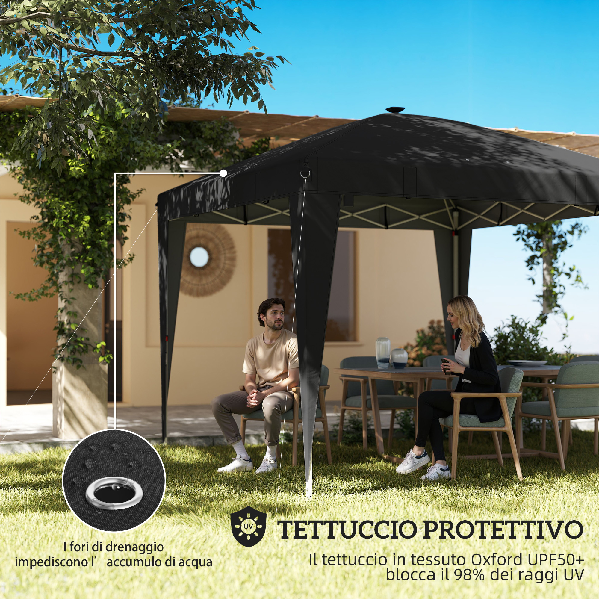 Un uomo e una donna siedono sotto un gazebo nero su un patio.