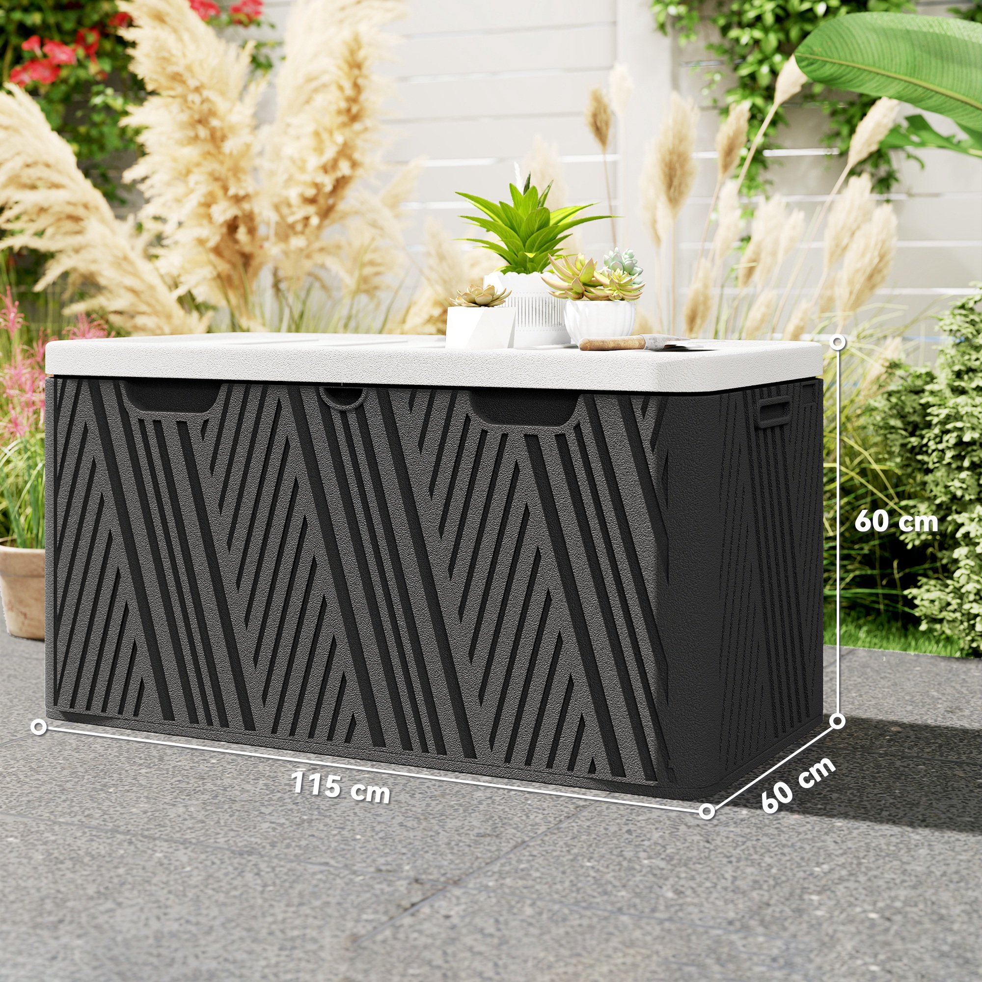 Contenitore portaoggetti nero con coperchio bianco su pavimentazione grigia, con piante.