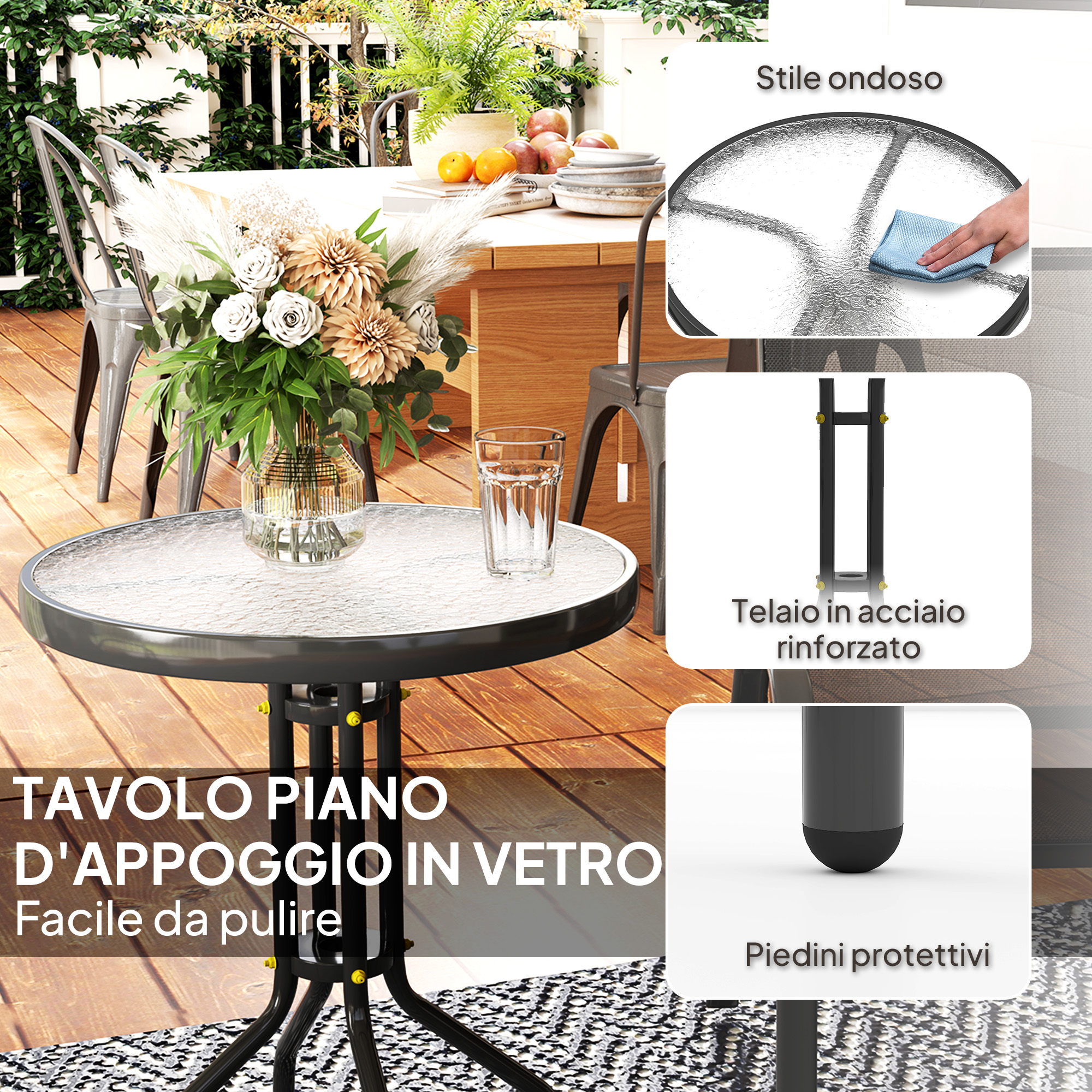 Un tavolino rotondo in vetro con fiori e frutta su un terrazzo in legno.