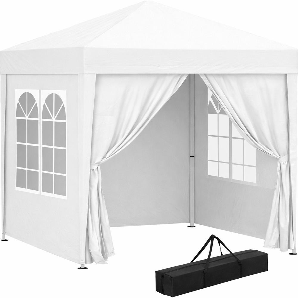 Una tenda bianca con finestre e tende, include borsa per il trasporto.