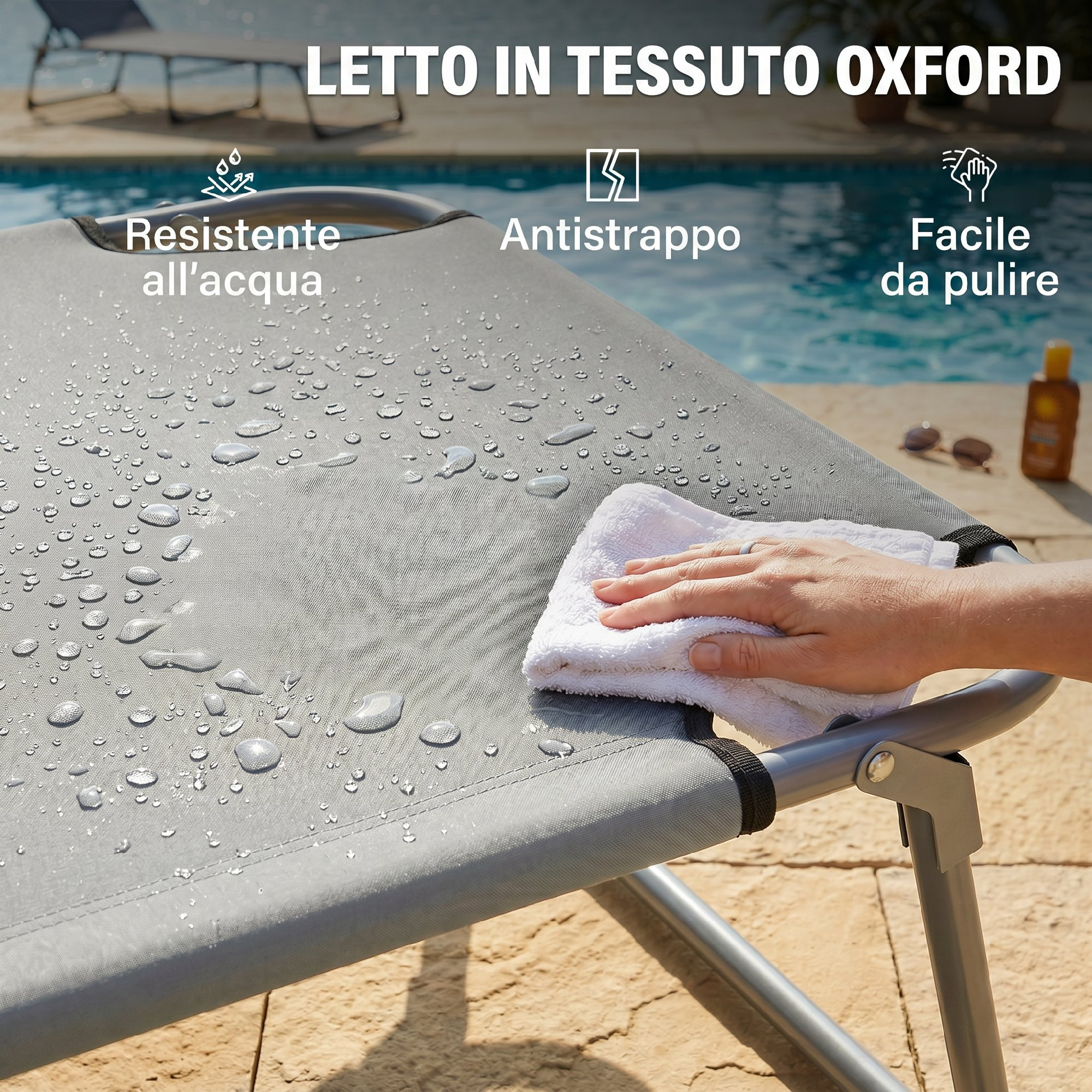Lettino prendisole in tessuto grigio con gocce d'acqua, mano che lo asciuga.