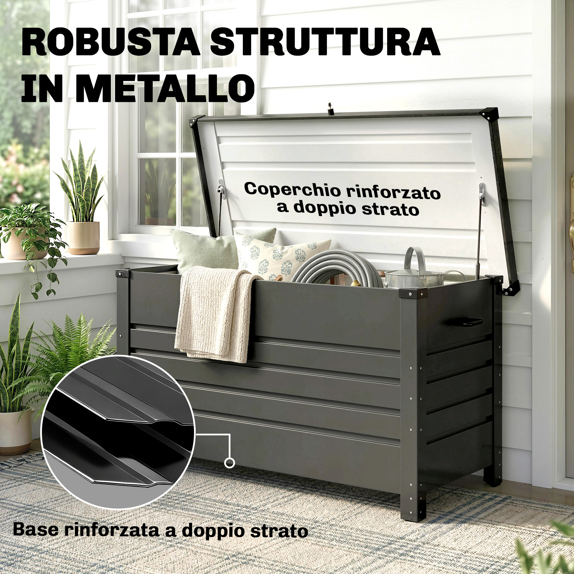 Contenitore grigio con coperchio aperto, cuscini, coperta, tubo, annaffiatoio, piante.