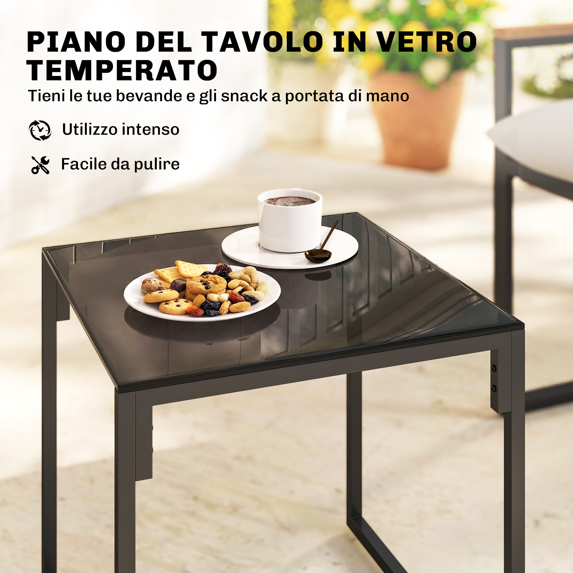 Un tavolino con piano in vetro, con un piatto di biscotti e noci e una tazza di caffè.