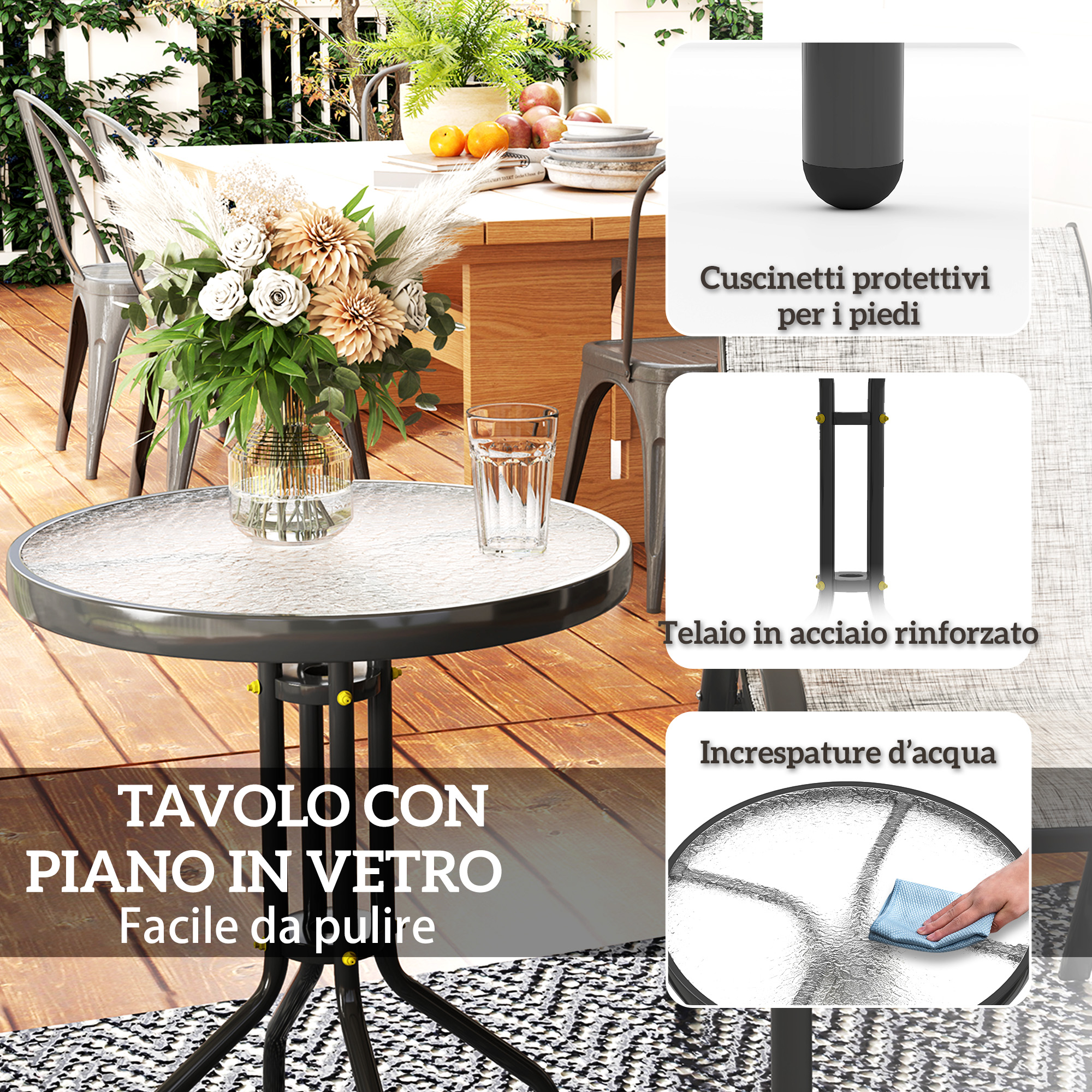 Tavolo rotondo con piano in vetro e gambe in metallo, decorato con fiori e frutta.