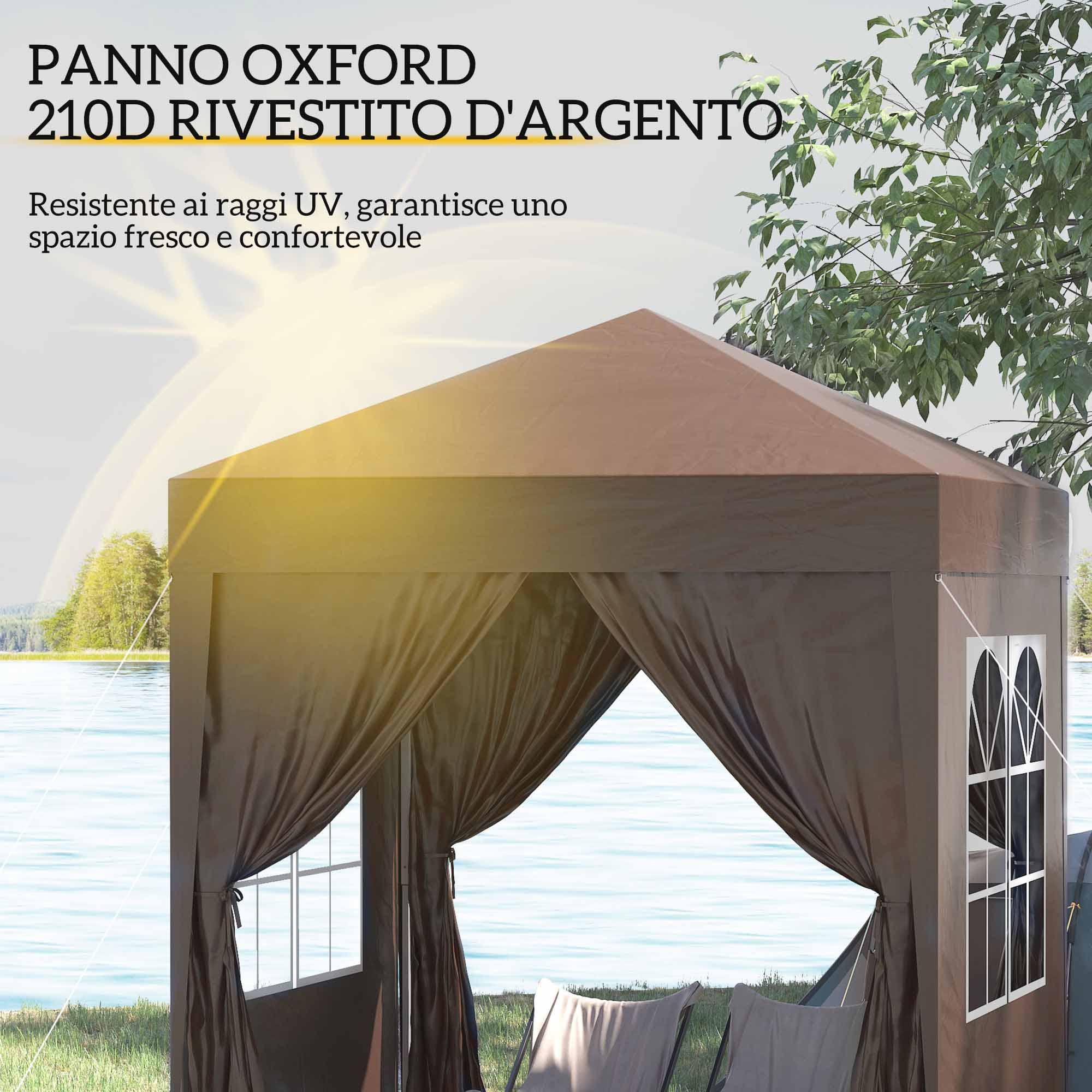 Un gazebo con finestre vicino all'acqua, con alberi sullo sfondo.
