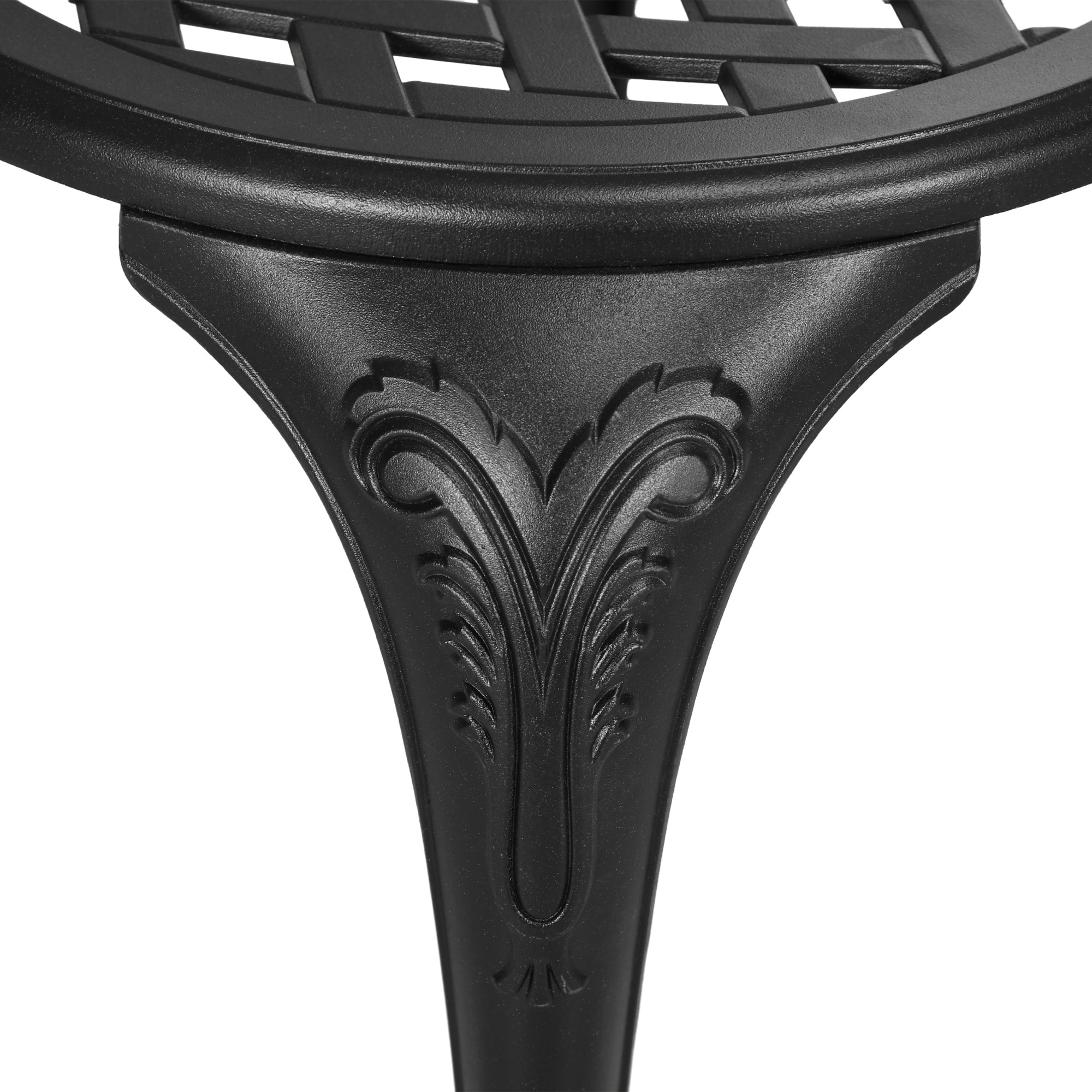 Gamba del tavolo verniciata di nero con volute ornate e dettaglio superiore intrecciato.