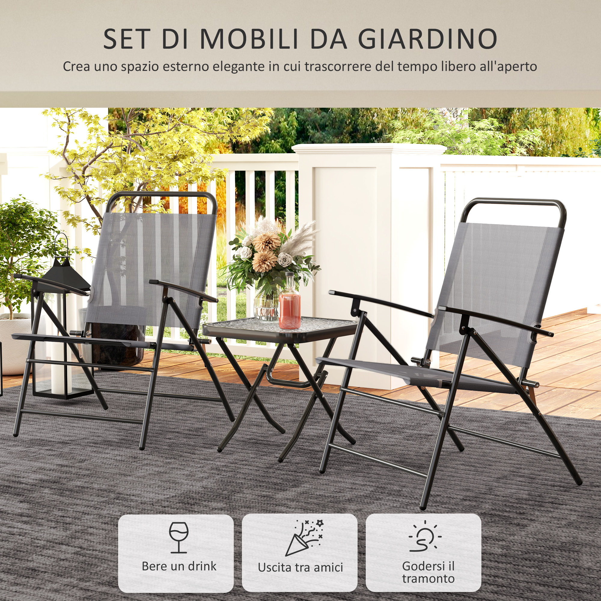 Set di mobili da giardino con sedie, tavolo e piante su una terrazza.