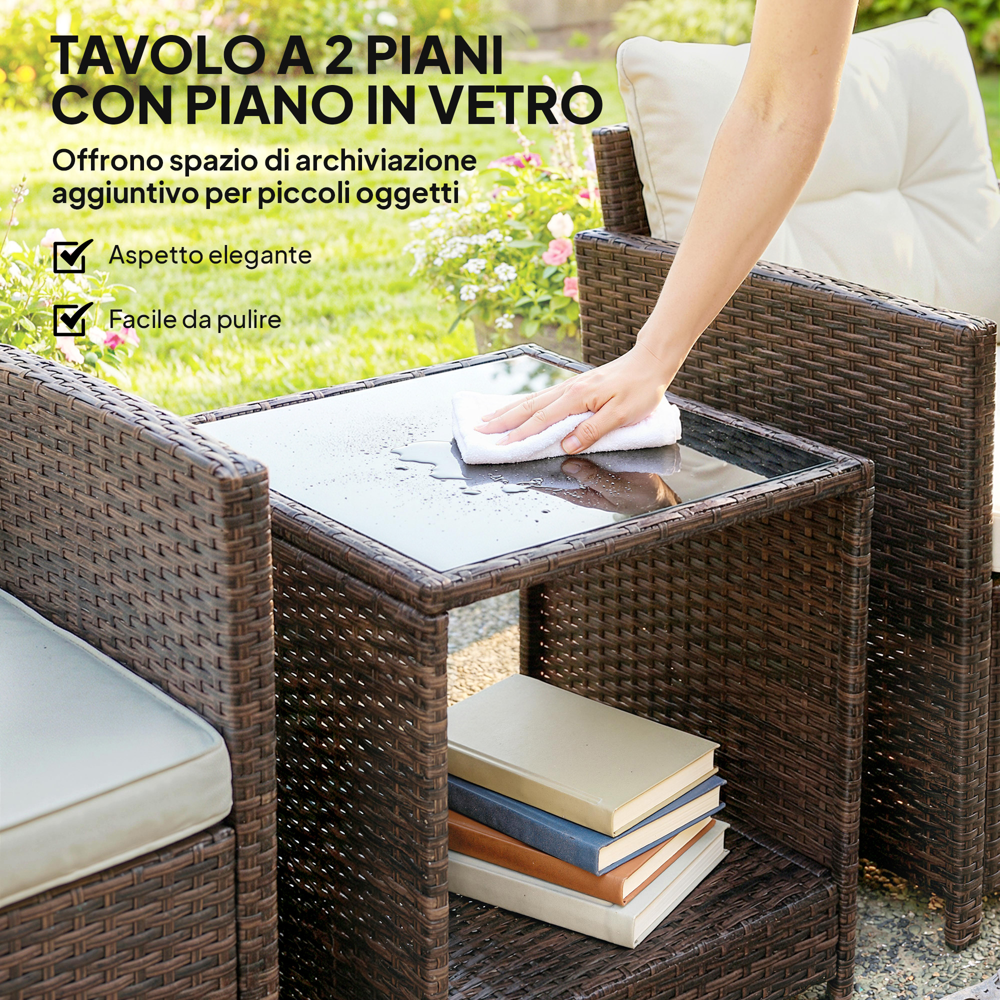 Tavolino in rattan marrone con piano in vetro che viene pulito. Libri impilati.