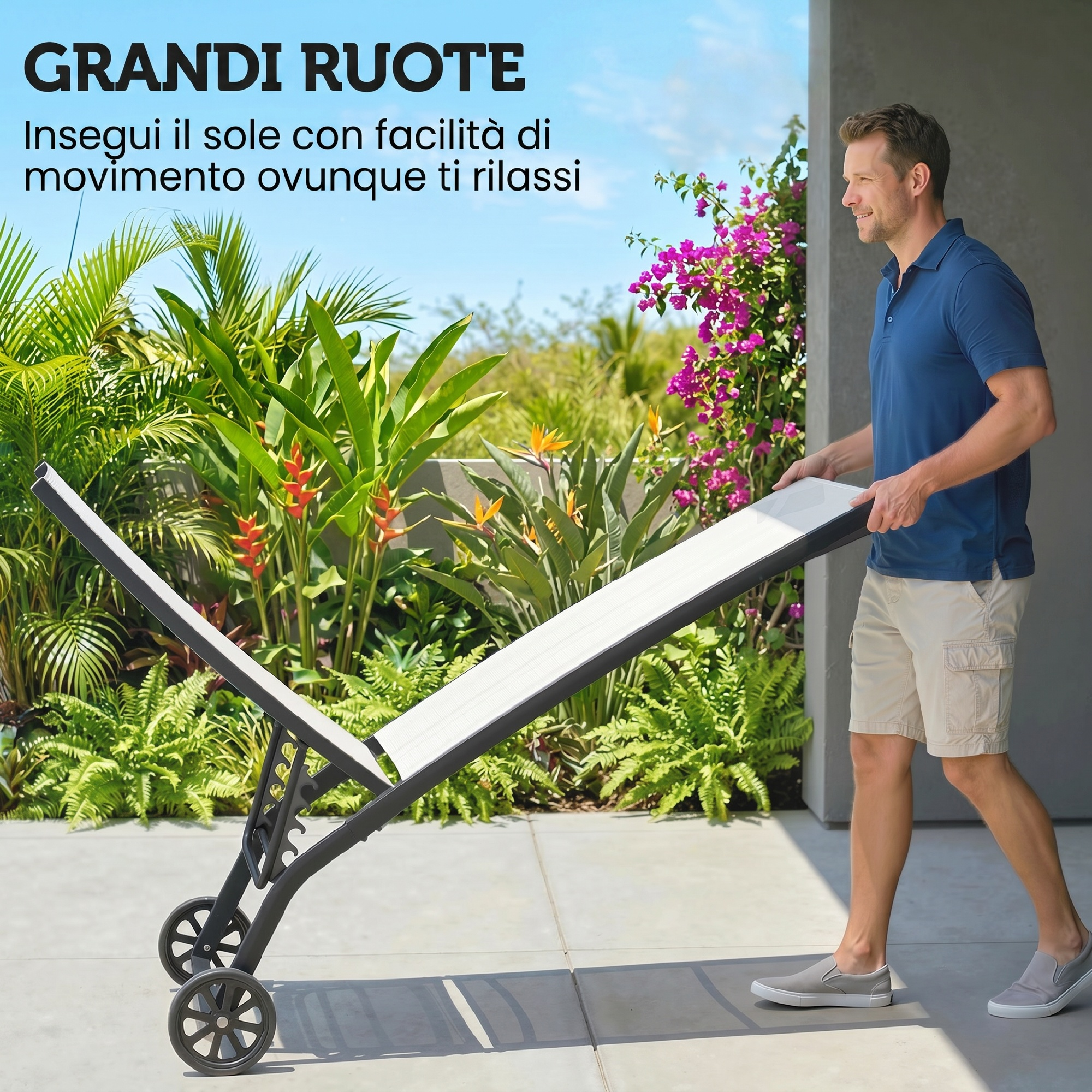 Uomo spinge lettino con ruote grandi in giardino verde, cielo azzurro.