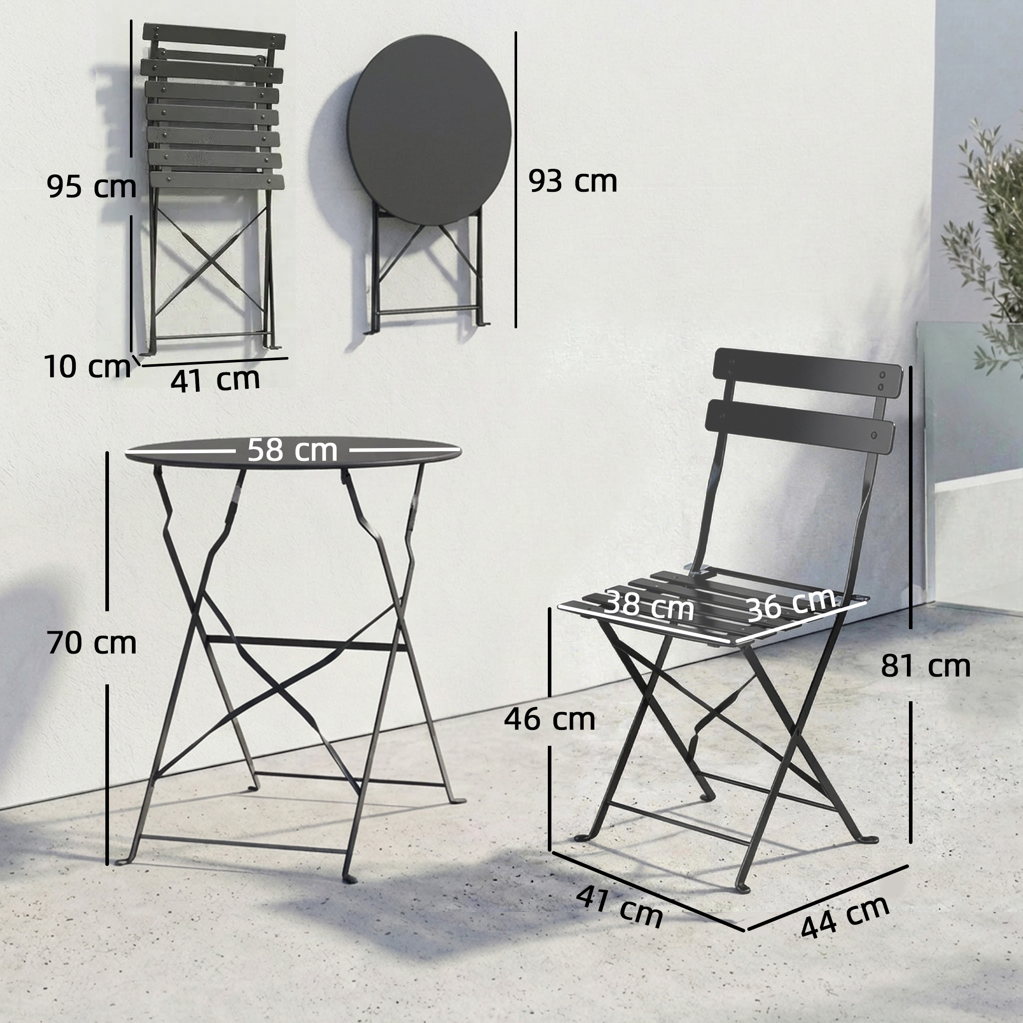Tavolo pieghevole nero (58x70cm) e sedia (44x81cm) su muro bianco.