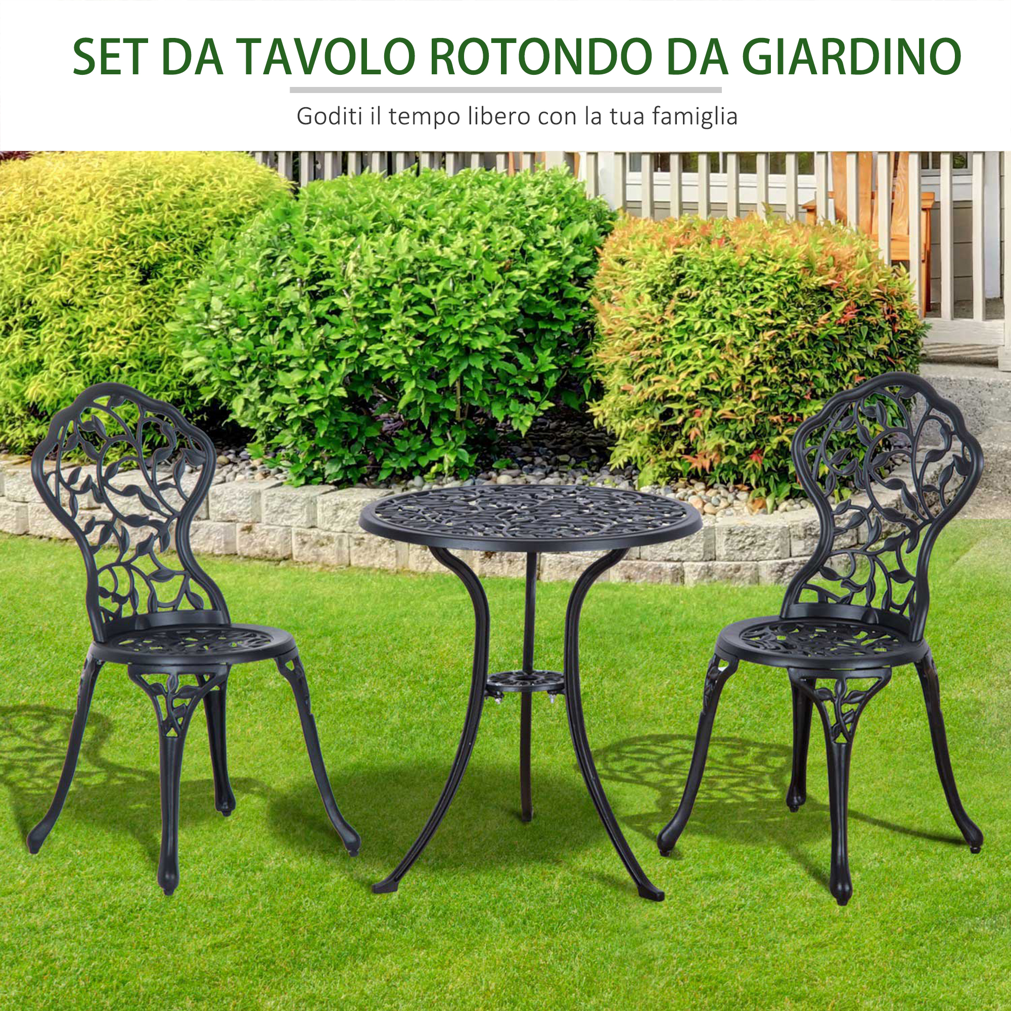Set di mobili da giardino neri con tavolo rotondo e due sedie su prato verde.