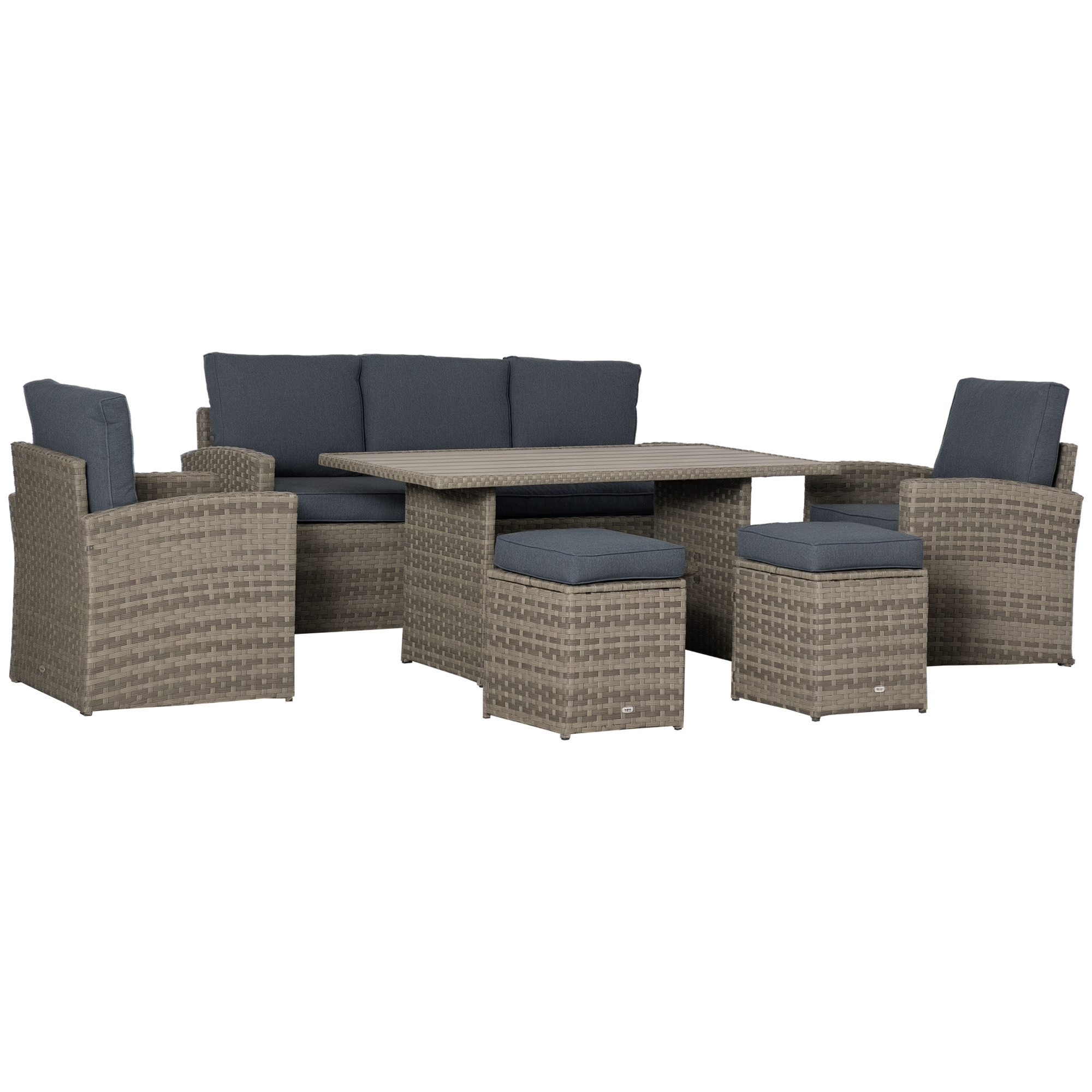 Mobili in rattan grigio: divano, due poltrone, tavolo e due pouf con cuscini.