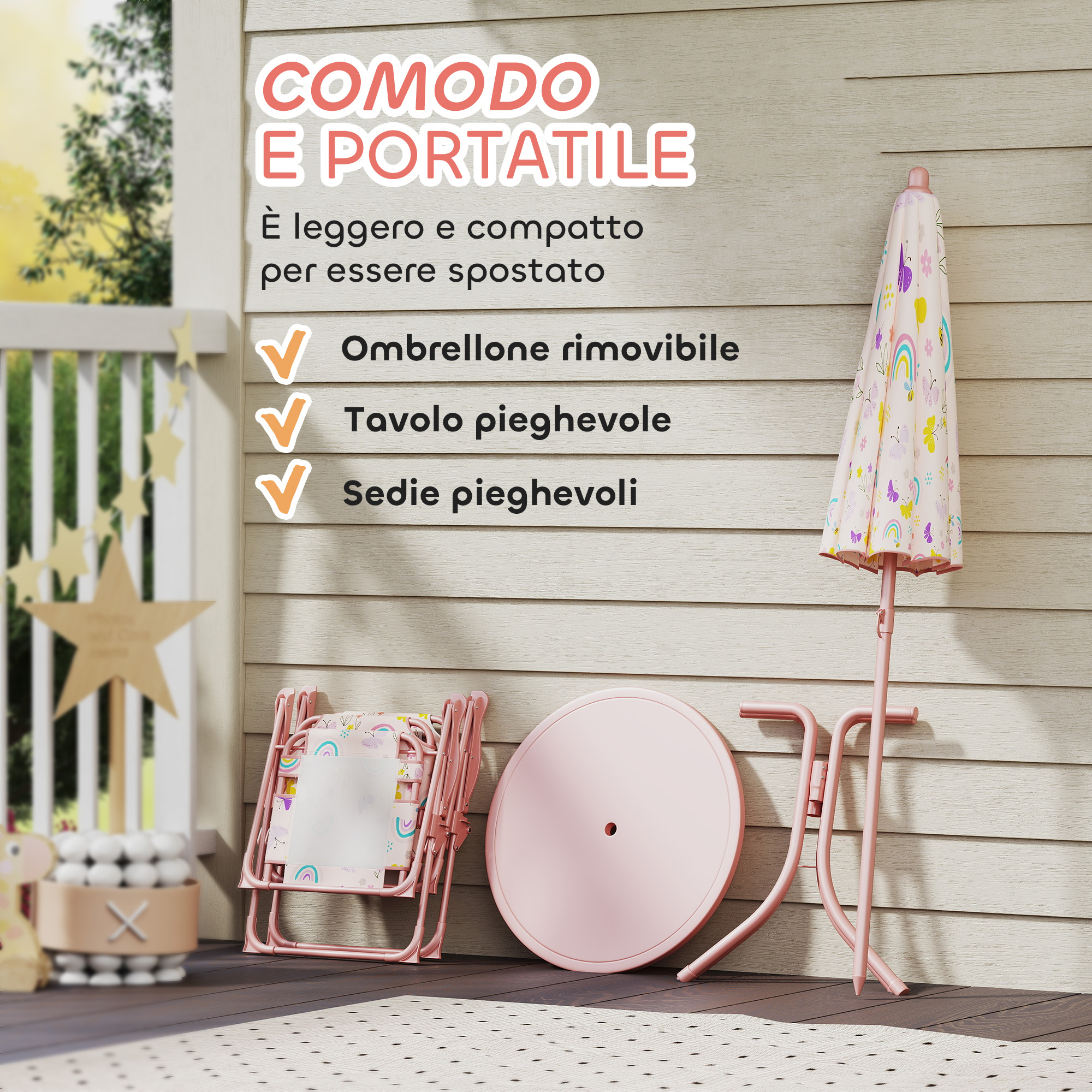 Un ombrellone rosa con motivi arcobaleno e farfalle, tavolo e sedie.