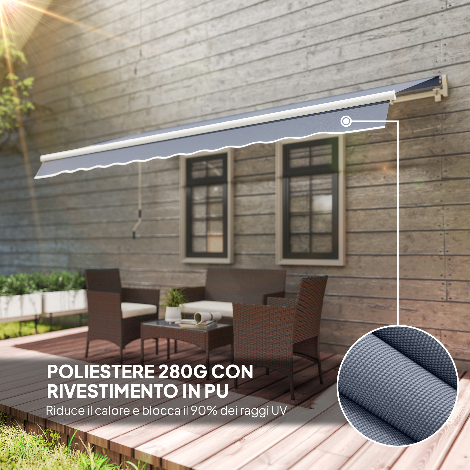 Una tenda da sole grigia estesa su un set di mobili da giardino su una terrazza in legno.