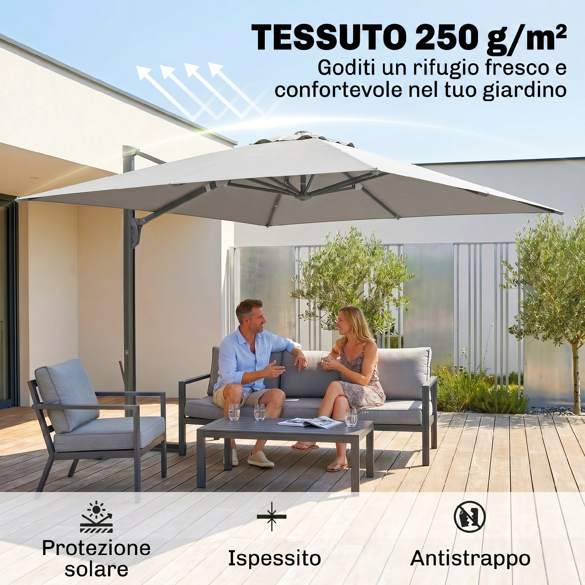 Una coppia seduta su un divano sotto un ombrellone su un terrazzo in legno.