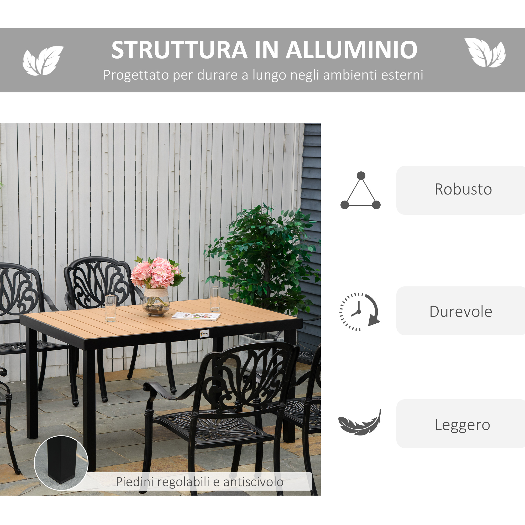Set da pranzo esterno in alluminio con tavolo, sedie, centrotavola floreale e bicchieri.
