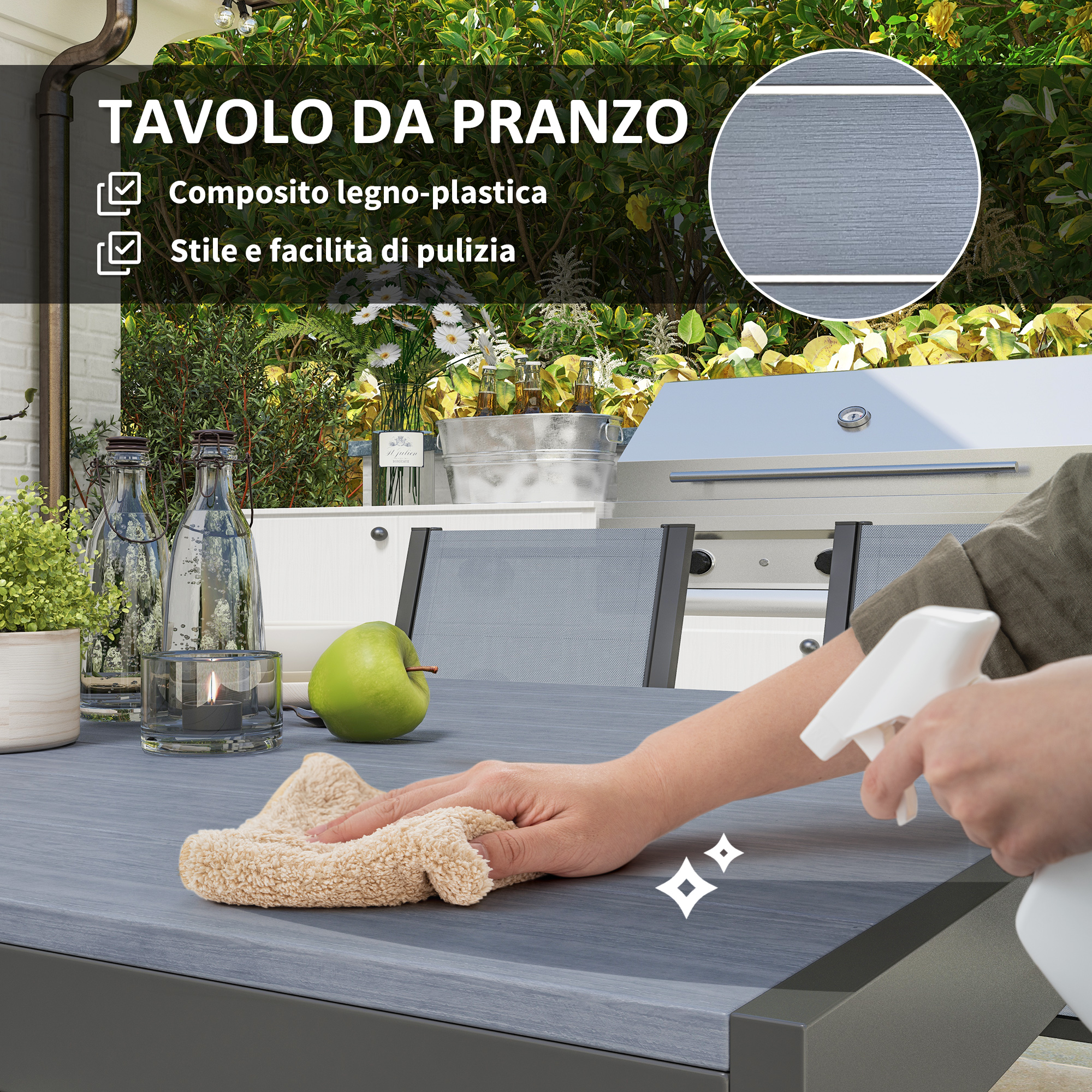 Una mano pulisce un tavolo grigio con un panno, tenendo uno spruzzino vicino.