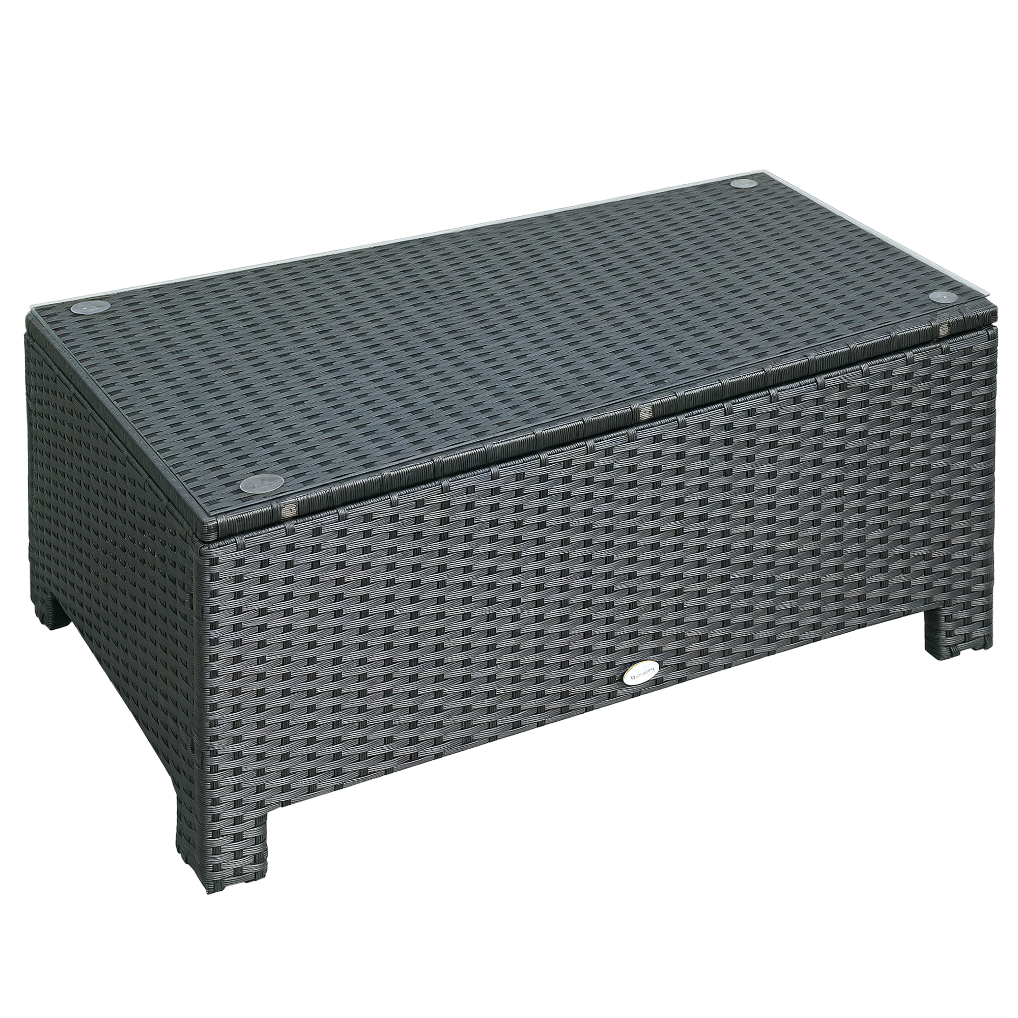 Un tavolino rettangolare in rattan scuro con piano in vetro poggia su quattro gambe corte.
