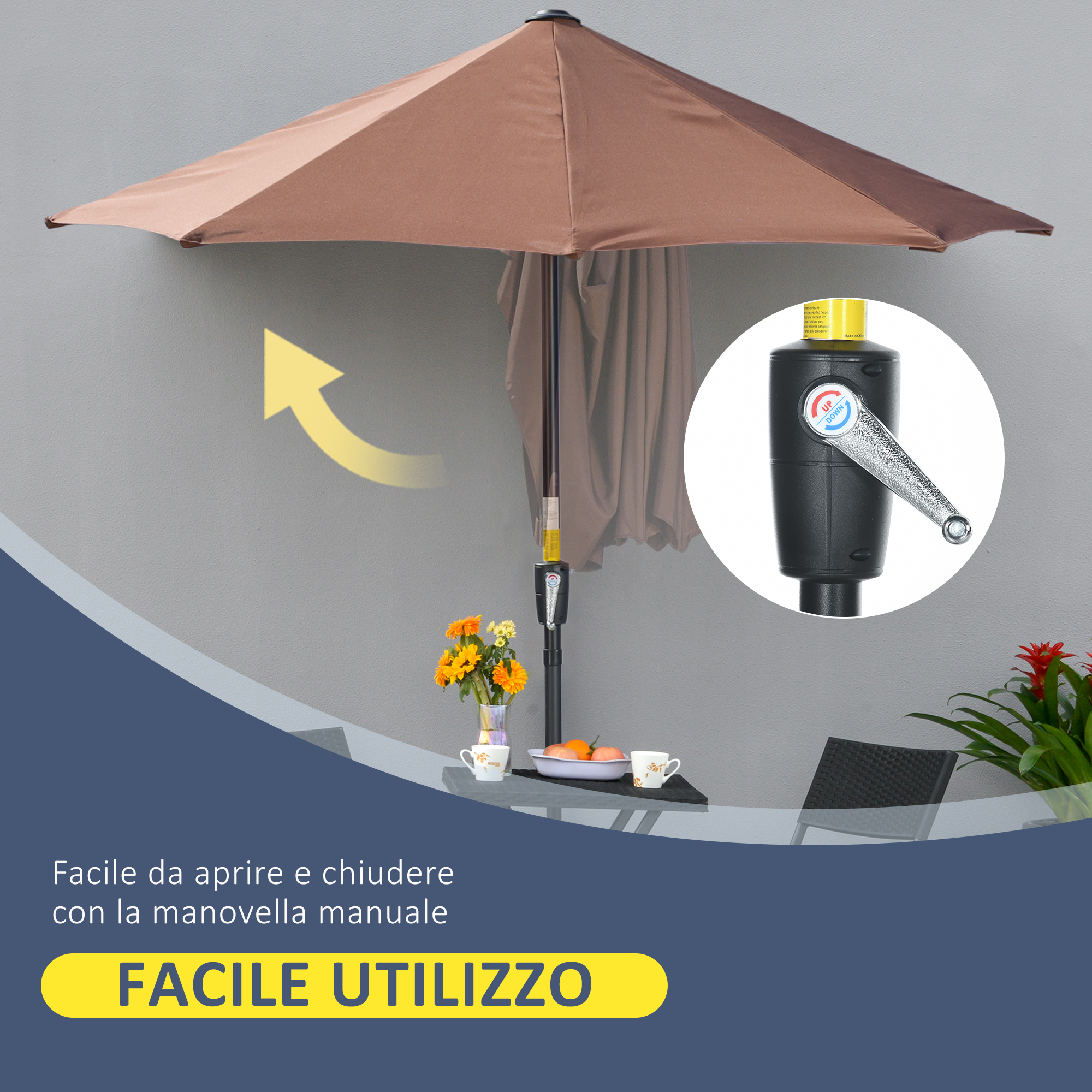 Un ombrellone da esterno marrone con manovella per aprirlo e chiuderlo.