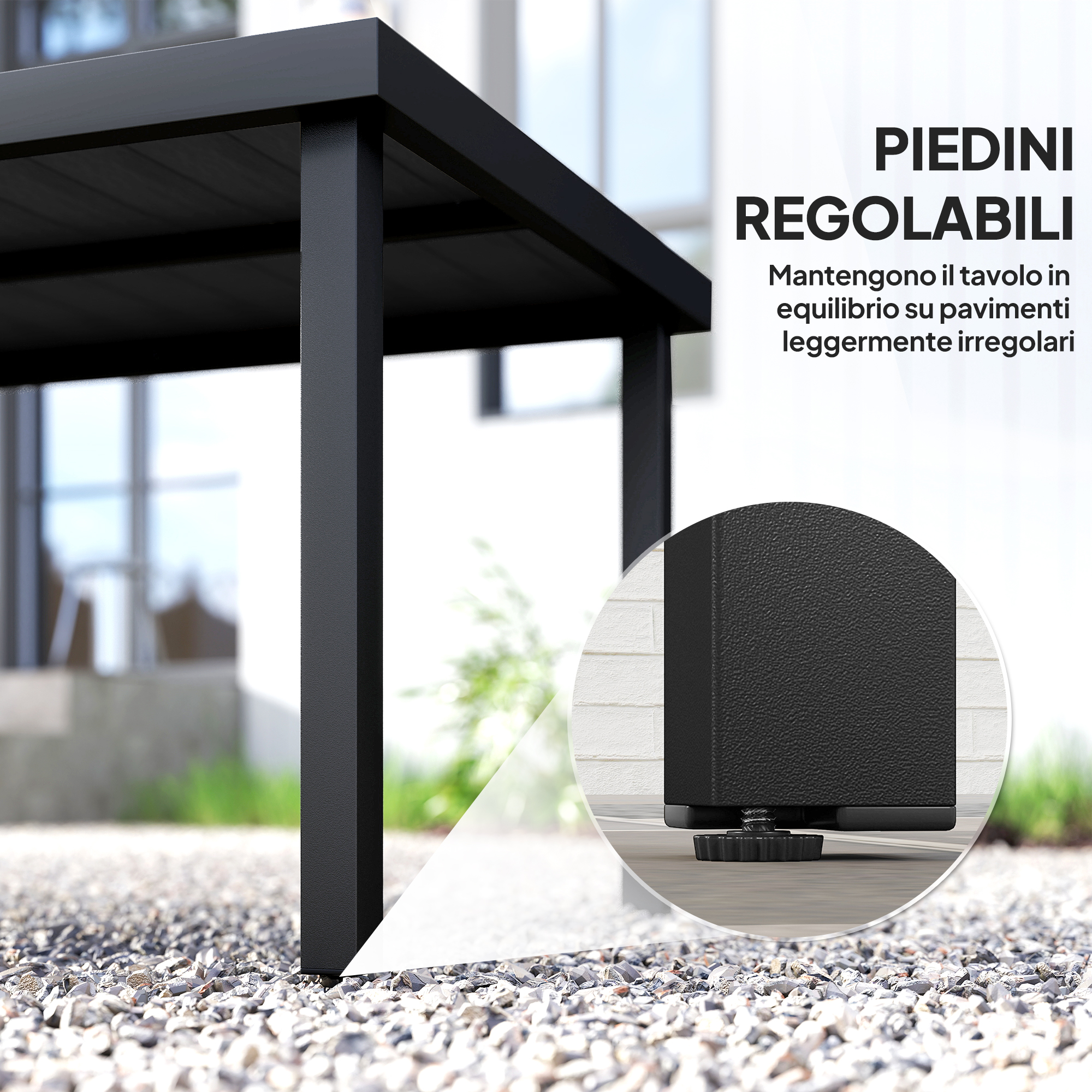 Tavolo nero con piedini regolabili su ghiaia e cemento. Primo piano di un piede.