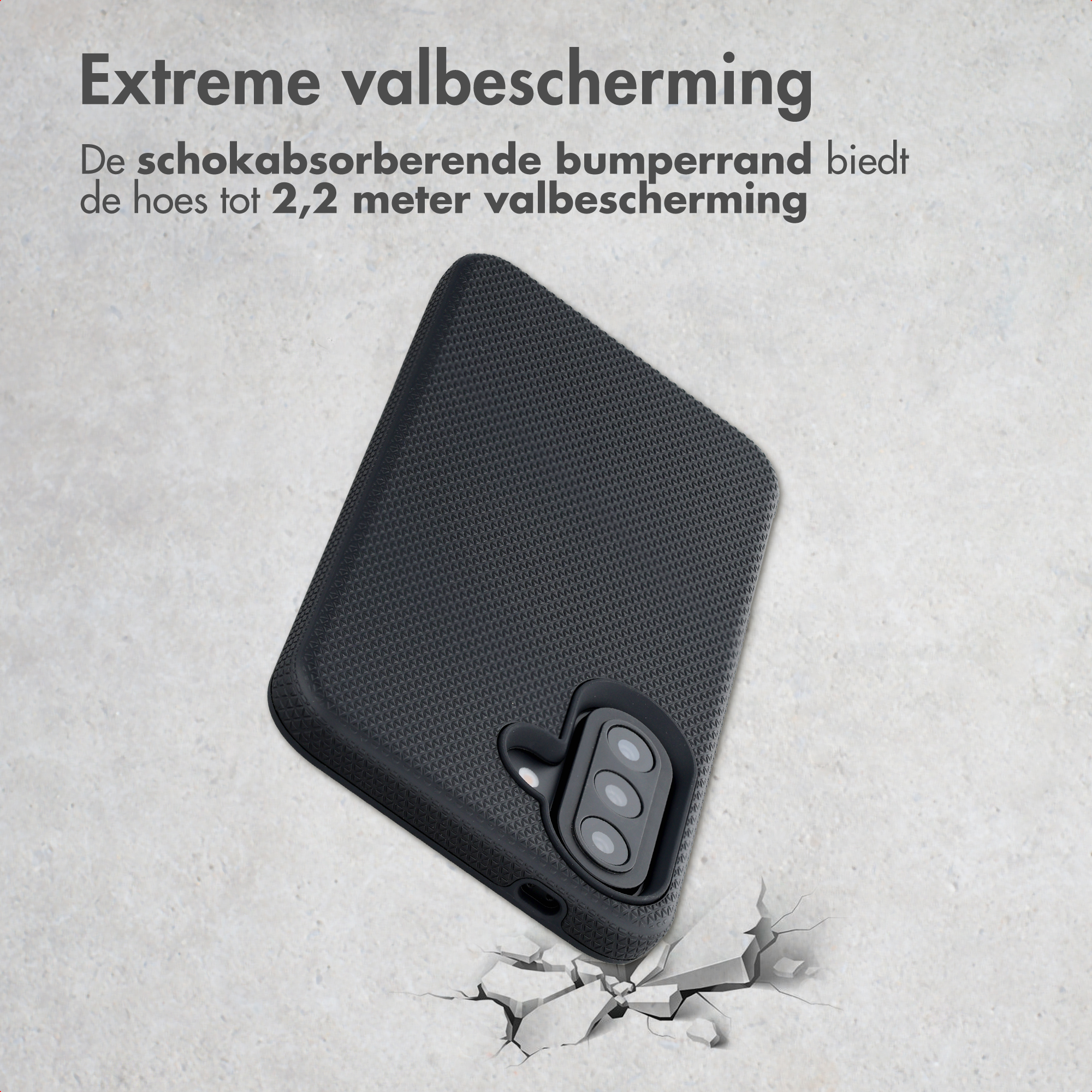 Black phone case with triple camera on cracked concrete.