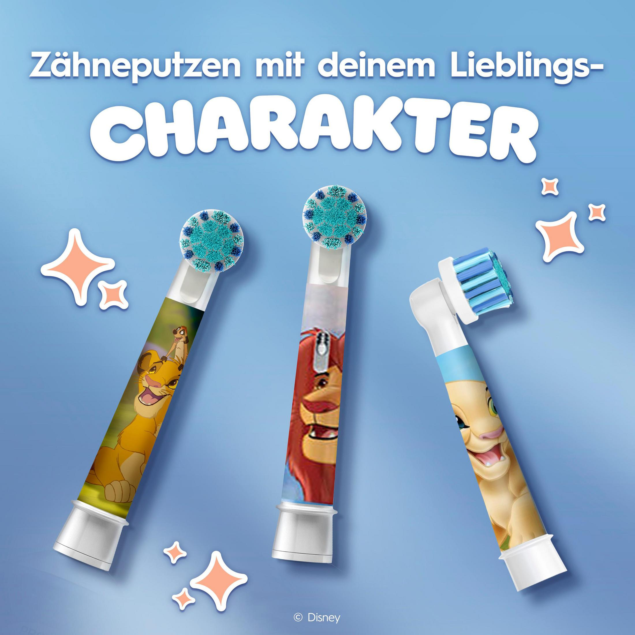 Drei Zahnbürstenköpfe mit Charakteren aus dem König der Löwen auf blauem Hintergrund.