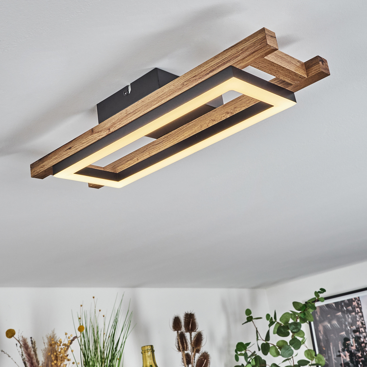 Eine rechteckige Deckenleuchte mit Holzrahmen und integrierter LED-Beleuchtung.