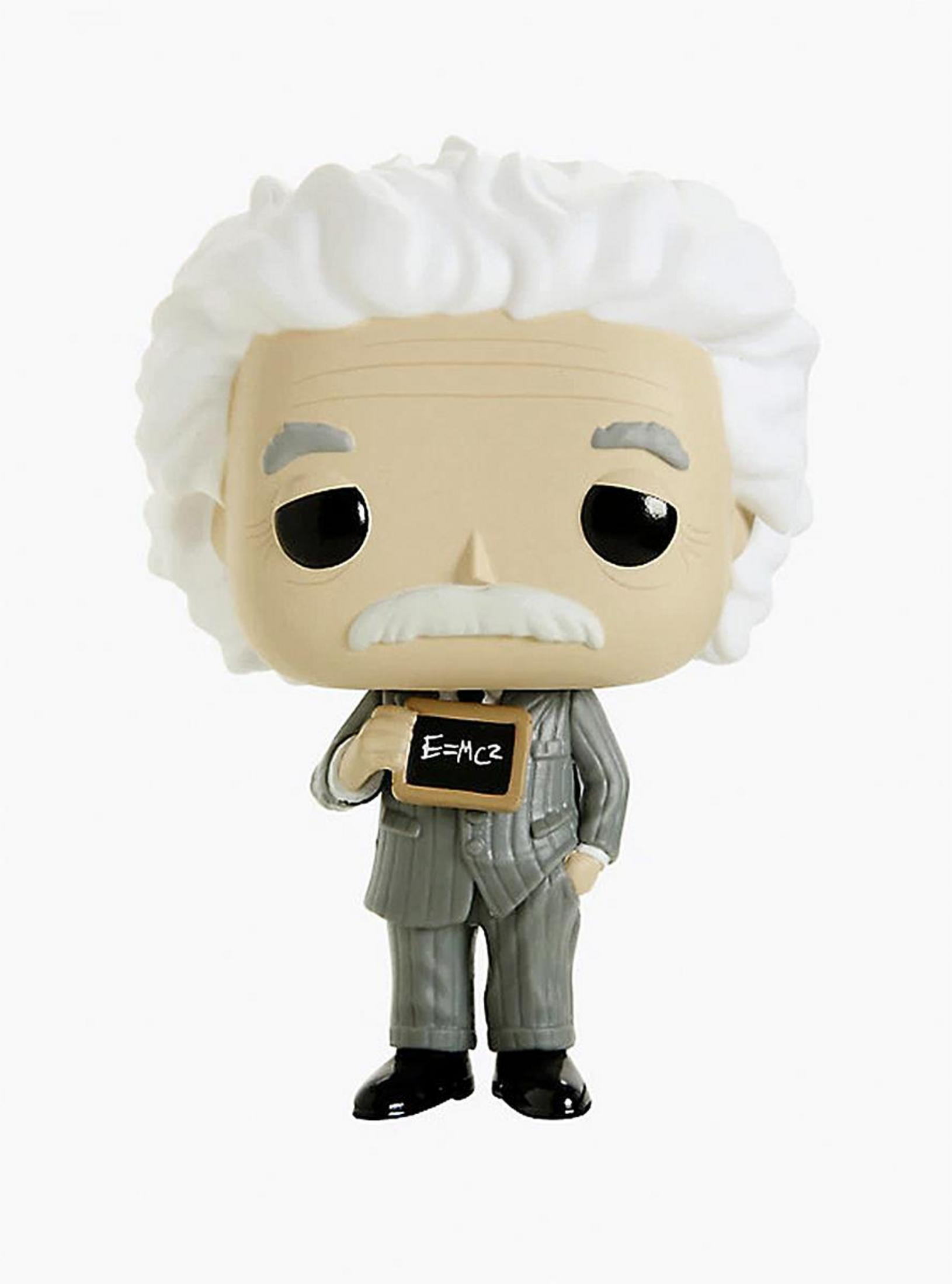Eine Funko-Puppe von Albert Einstein hält eine Tafel mit E=mc².