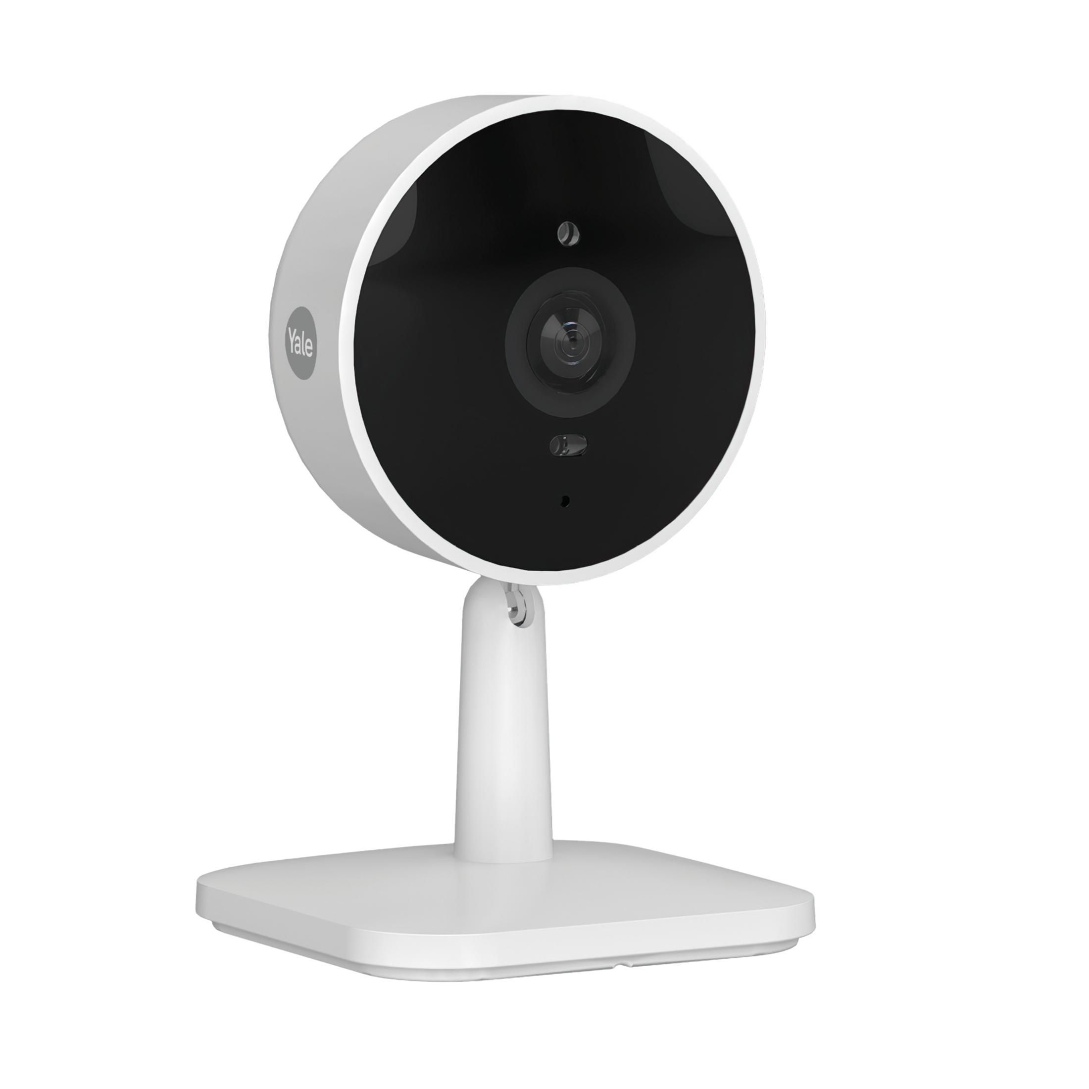Una telecamera di sicurezza bianca con obiettivo nero e logo Yale su un supporto.