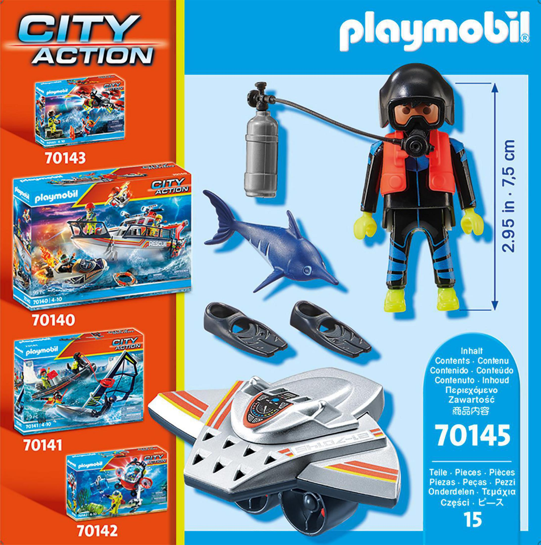 Tuffatore Playmobil con attrezzatura e giocattolo squalo, accanto a confezioni giocattolo.
