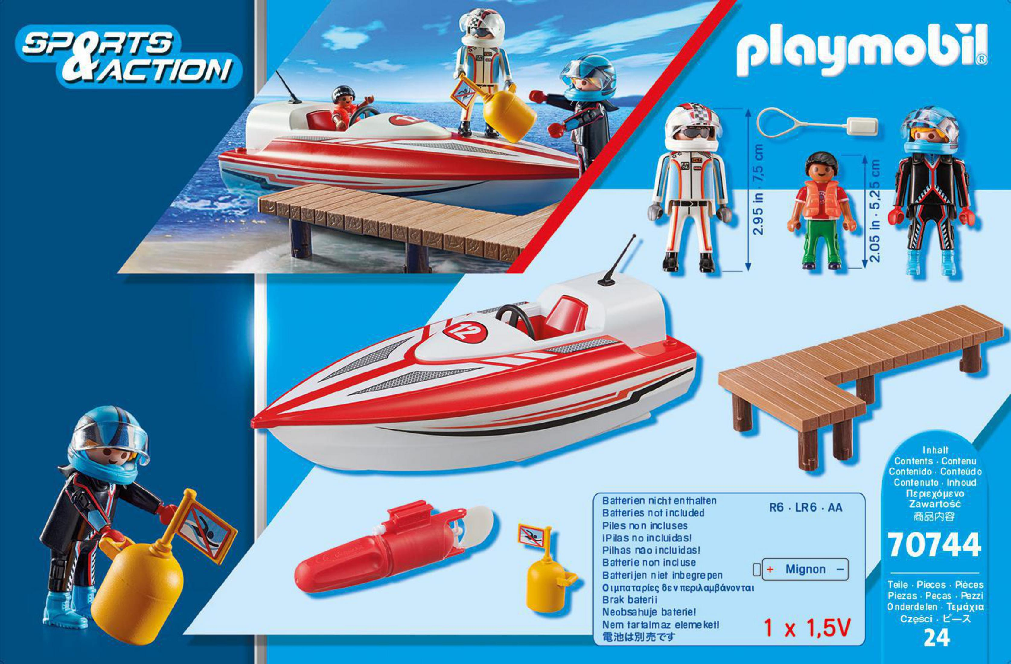 Set barca da corsa Playmobil con figure, accessori e pontile.