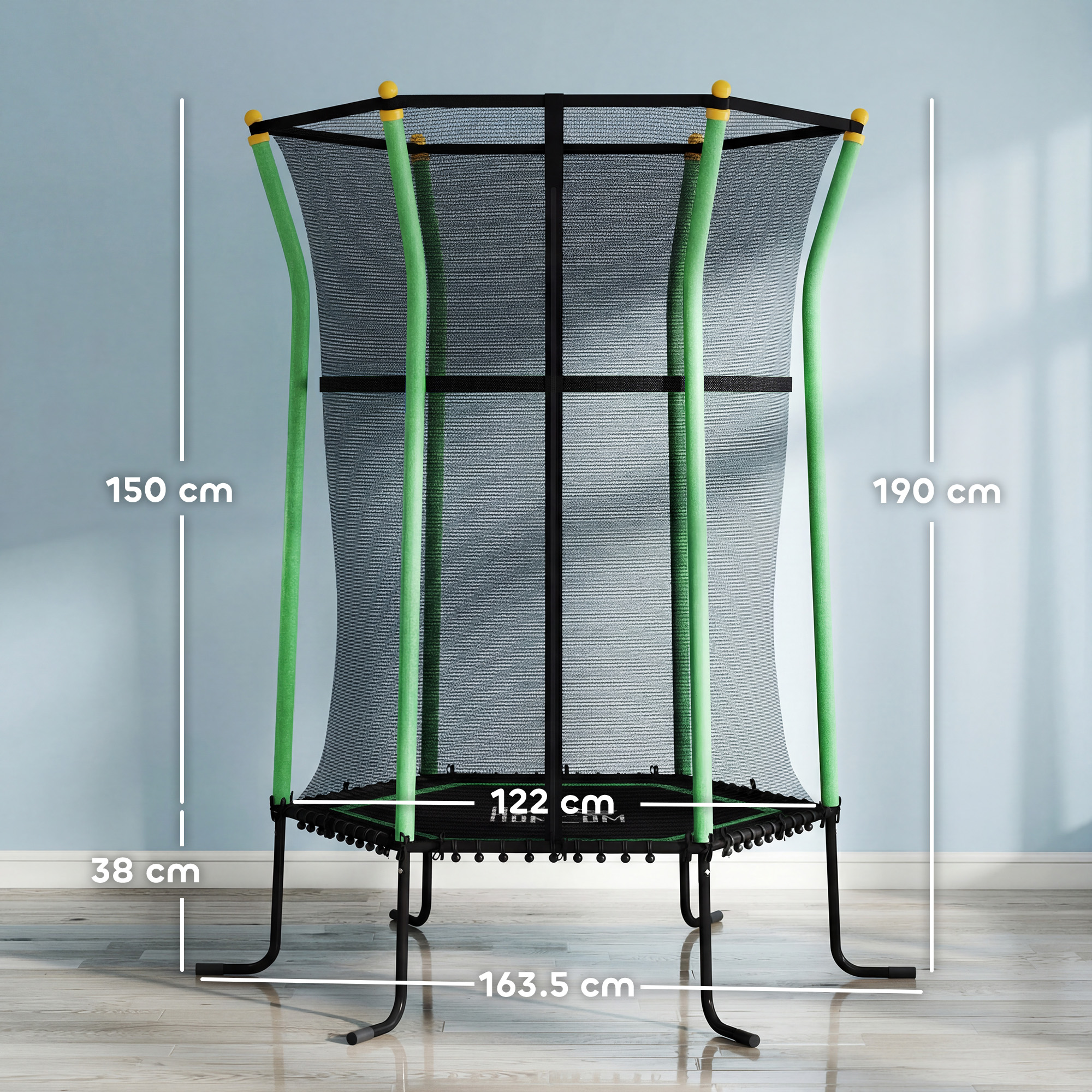 Trampolino con rete nera, imbottitura verde, tappi gialli. Dimensioni indicate.