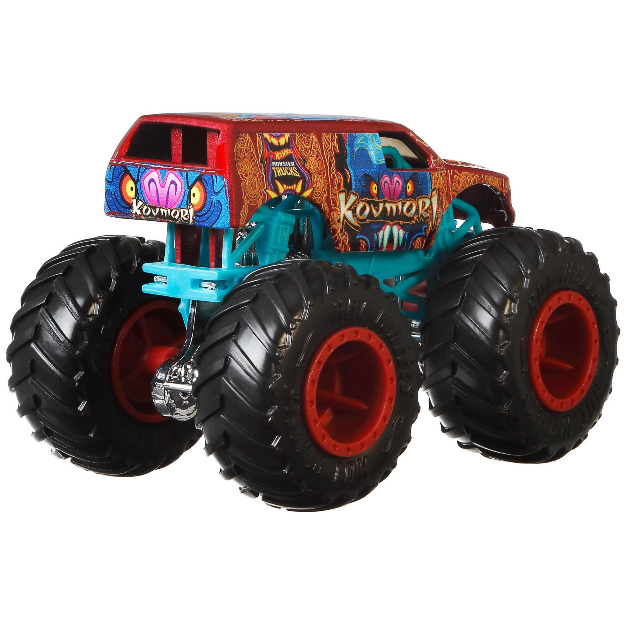 Een rode monster truck met een blauw chassis en "Kovmor" tekst.