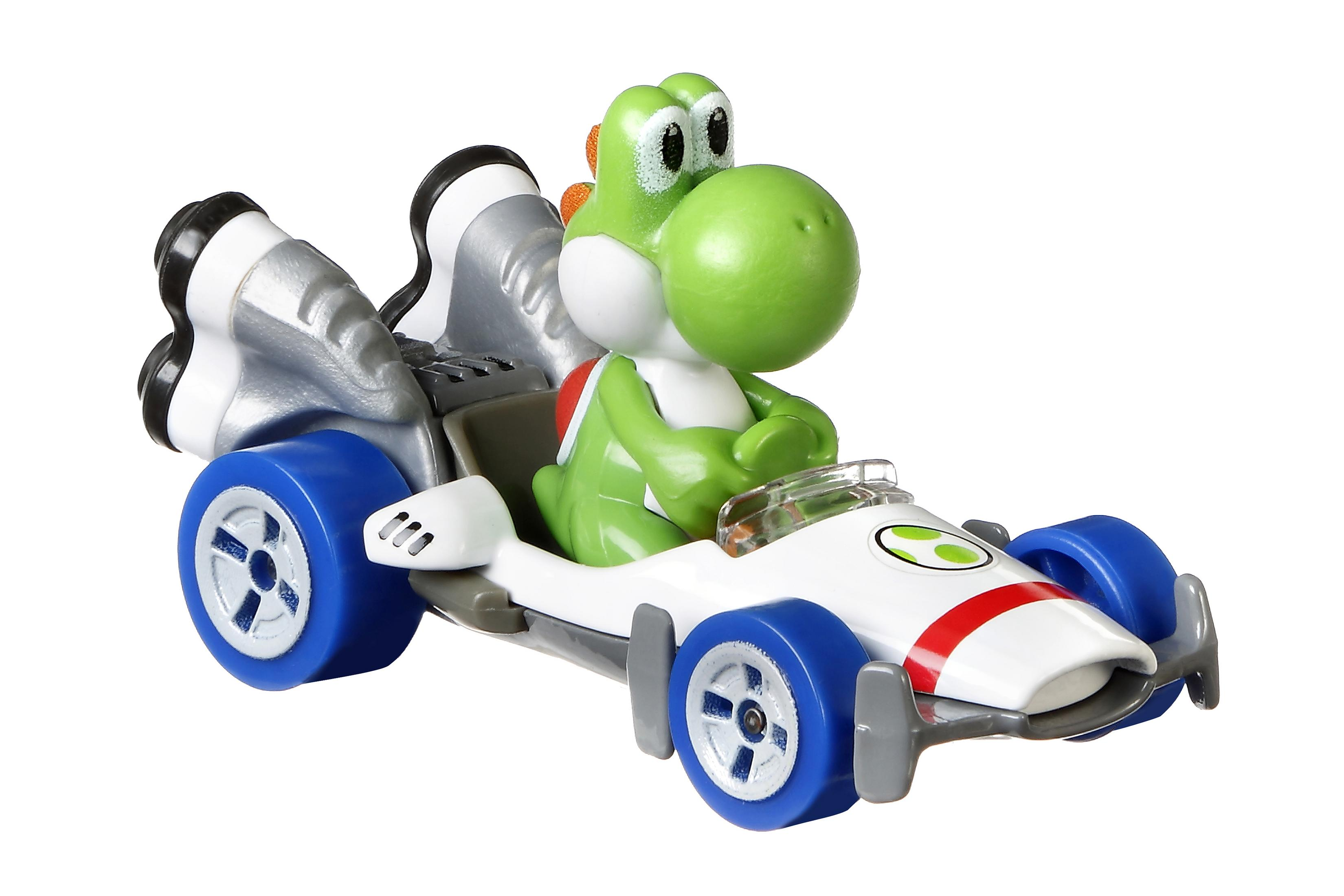 Grüner Yoshi fährt ein weißes Go-Kart mit blauen Rädern und silbernen Flügeln.