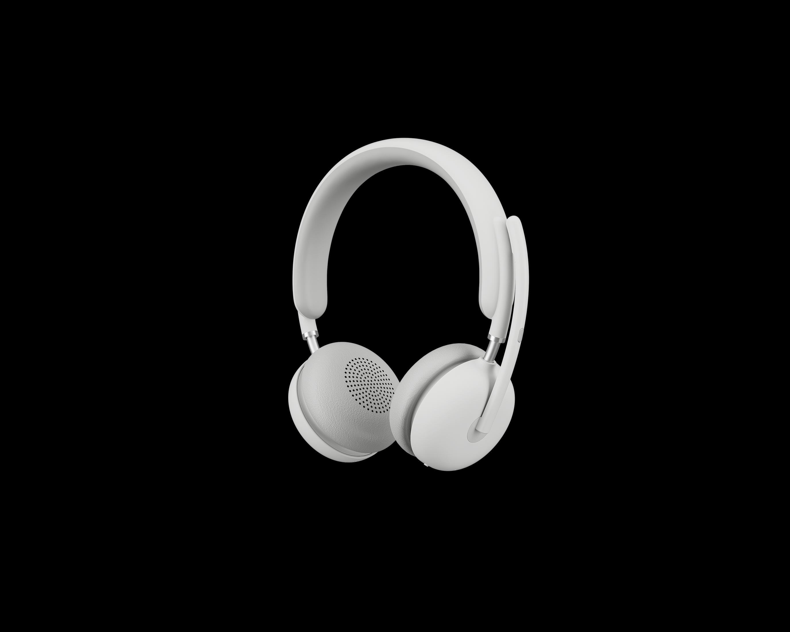 Cuffie wireless bianche con archetto e padiglioni perforati su sfondo nero.