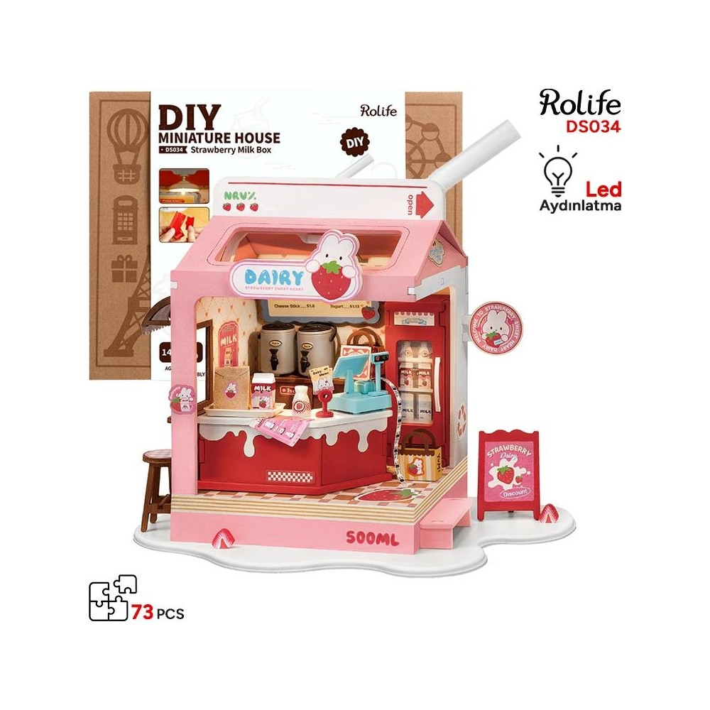 Un modello di negozio di latte rosa fai-da-te con insegne, bottiglie di latte e registratore di cassa.